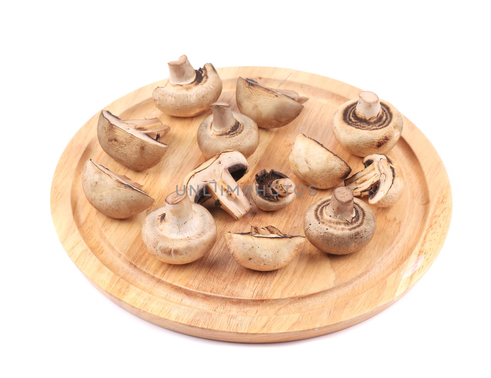 Close up of mushrooms on platter. Isolated on a white background.