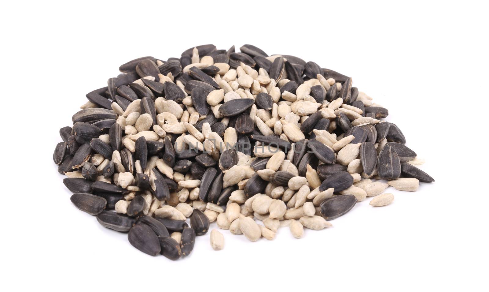 Bunch of white and black sunflower seeds. by indigolotos