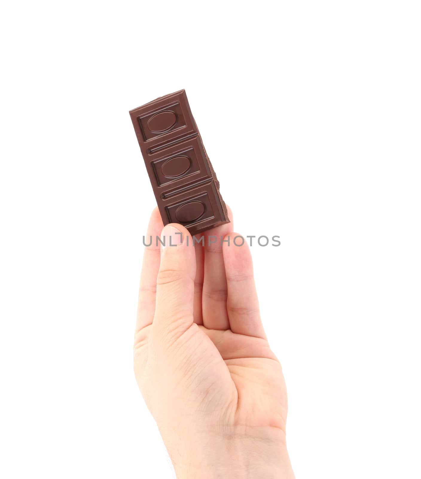 Chocolate bar in hand. Isolated on a white background.