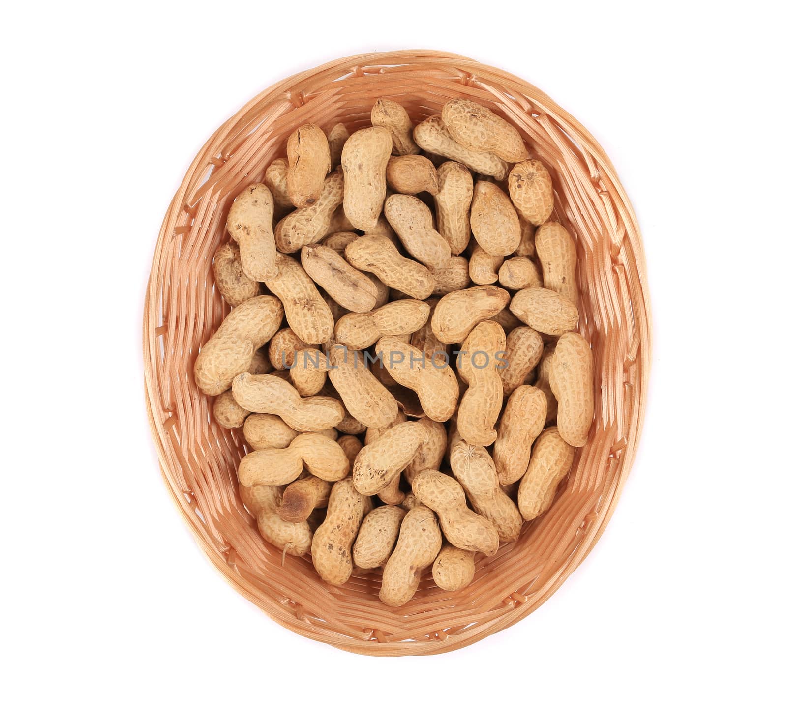Basket full with peanuts. Isolated on a white background.