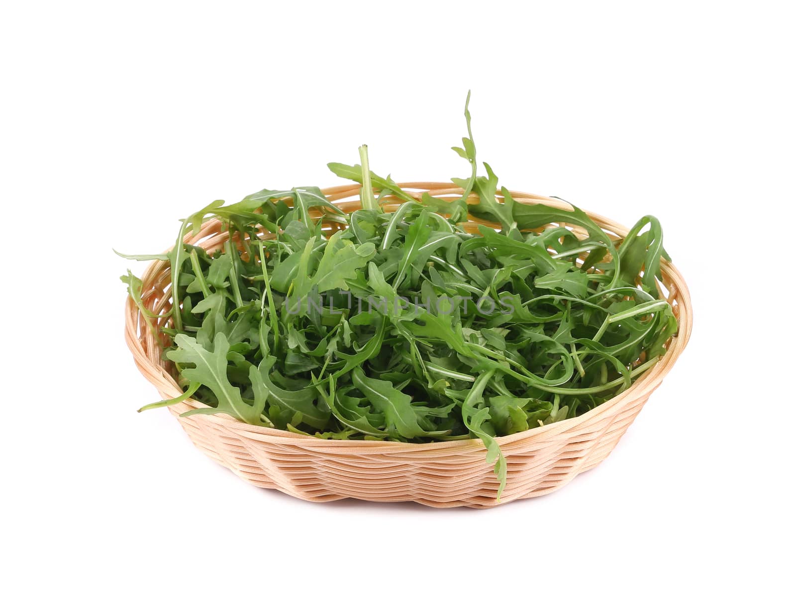 Fresh arugula salad. Isolated on a white background.