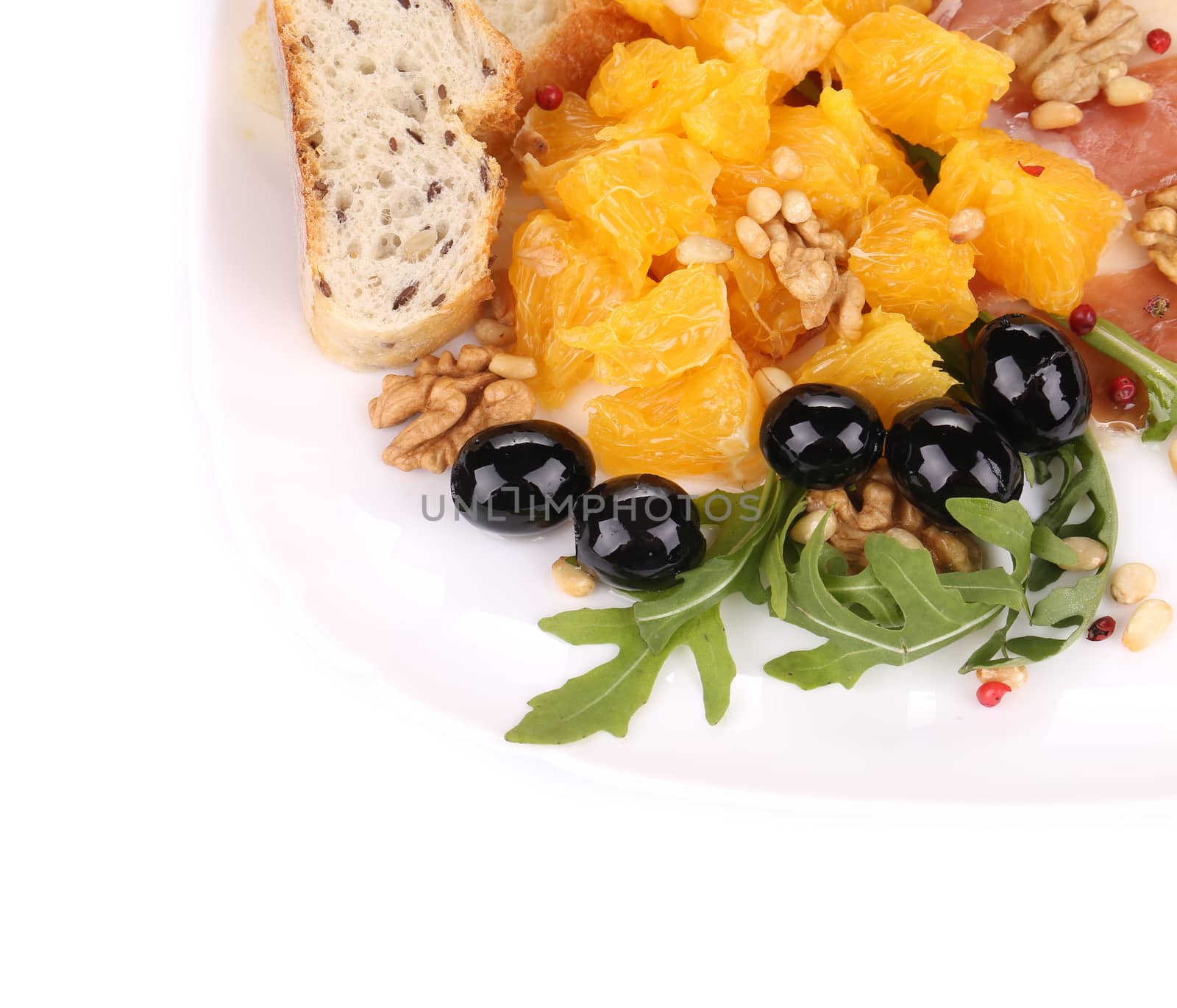 Salad with arugula and prosciutto. by indigolotos