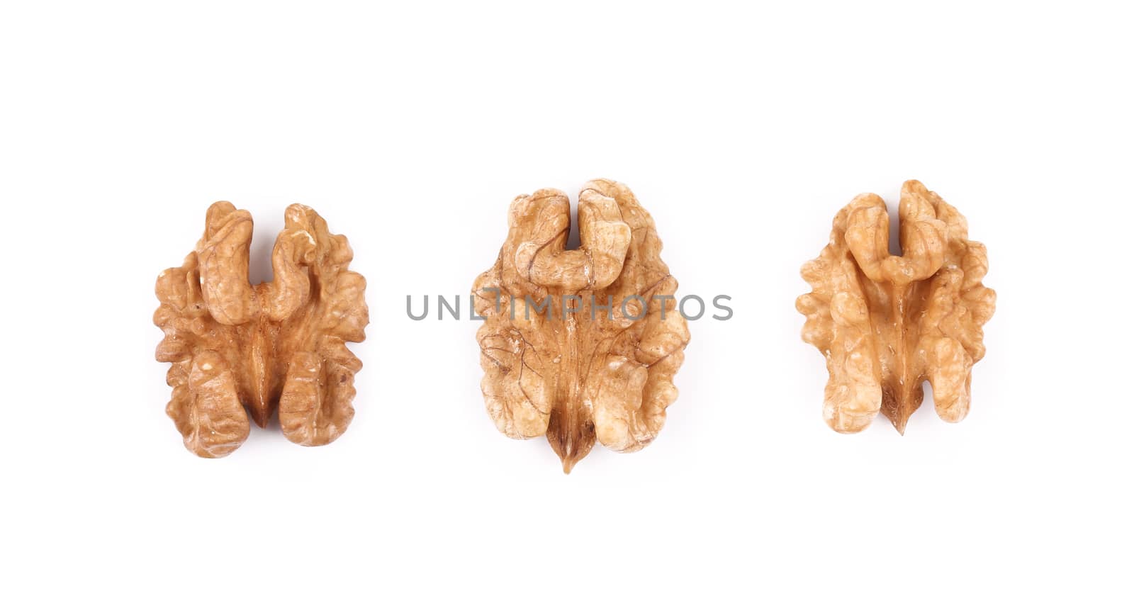 Close up of walnut kernels. Isolated on a white background.