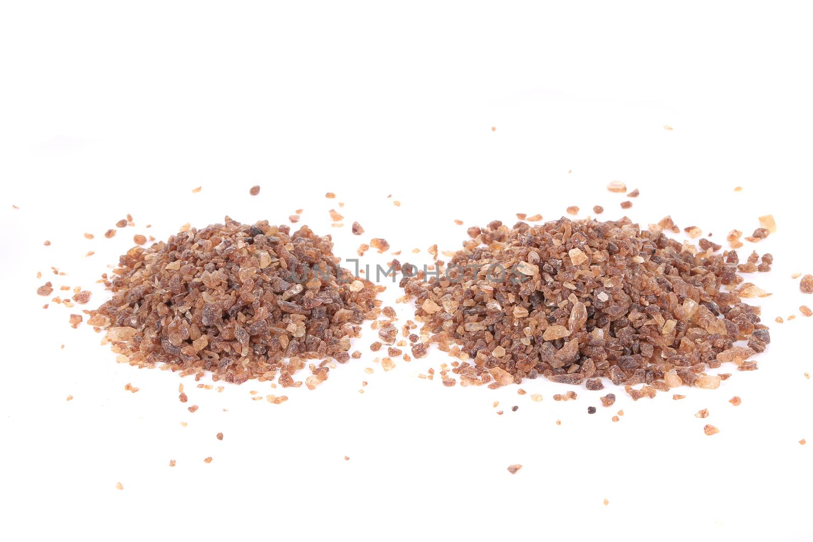 Brown sugar. Isolated on a white background.