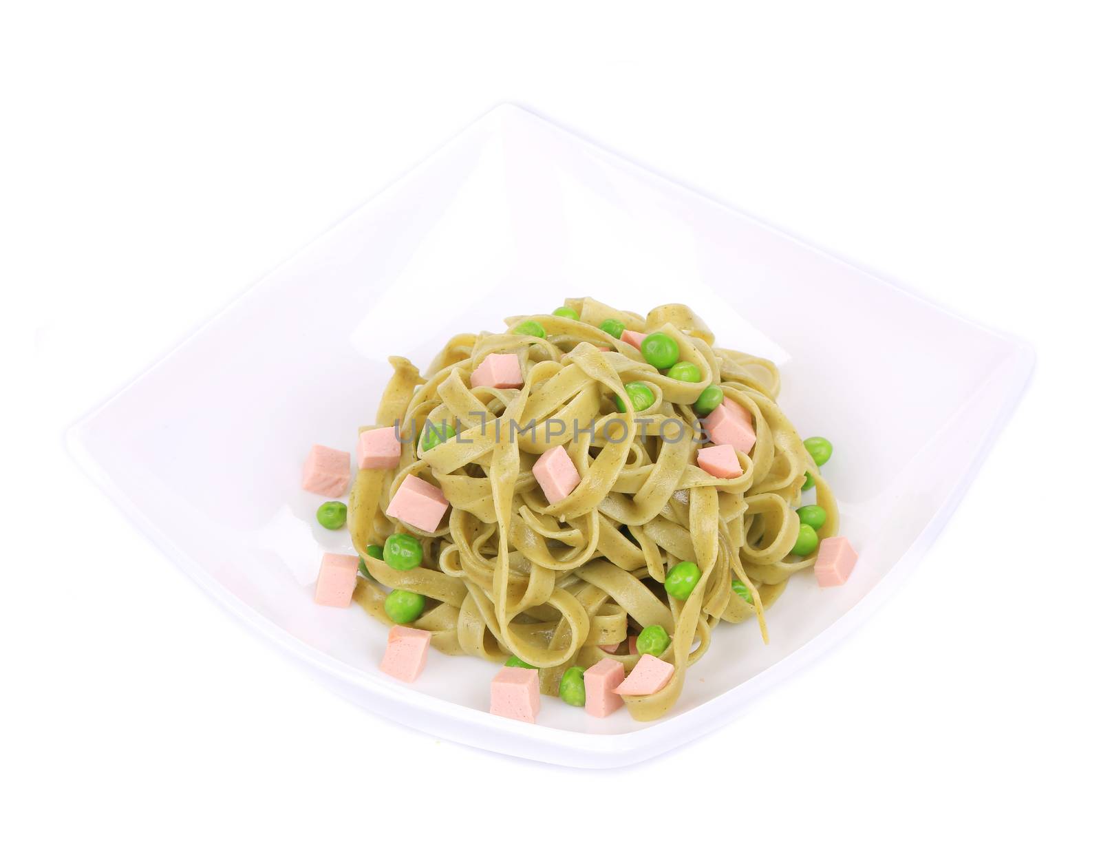 Pasta tagliatelle with green peas and ham. by indigolotos