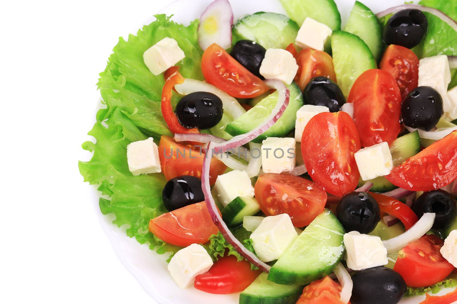 Greek salad. Isolated on a white background.