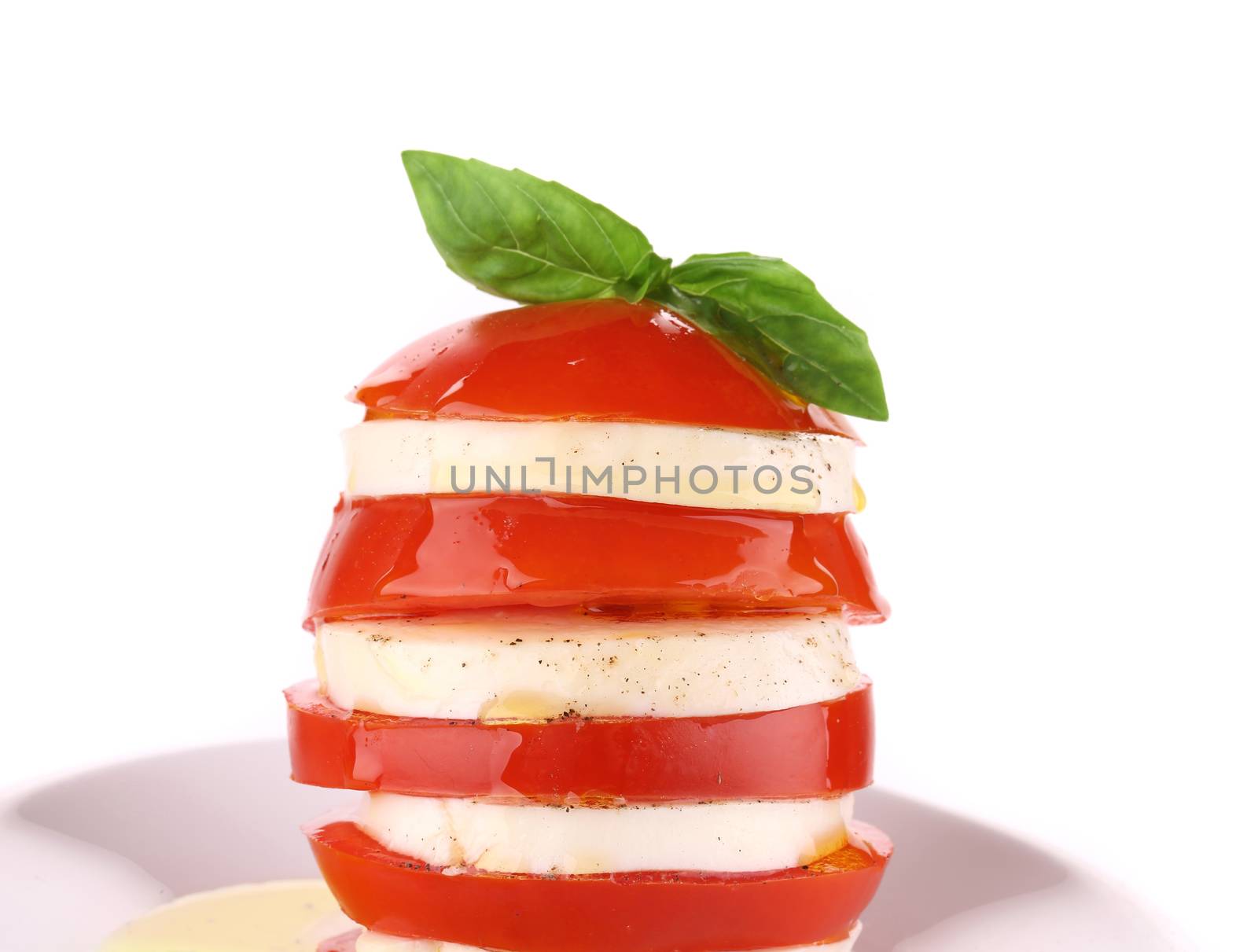 Caprese salad. Isolated on a white background.