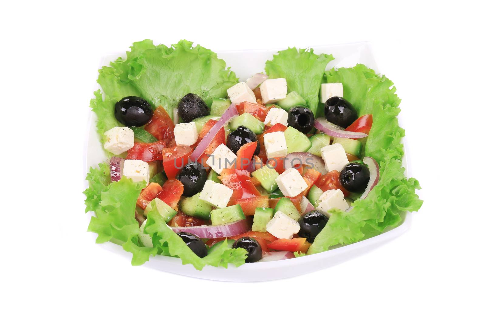 Greek salad. Isolated on a white background.