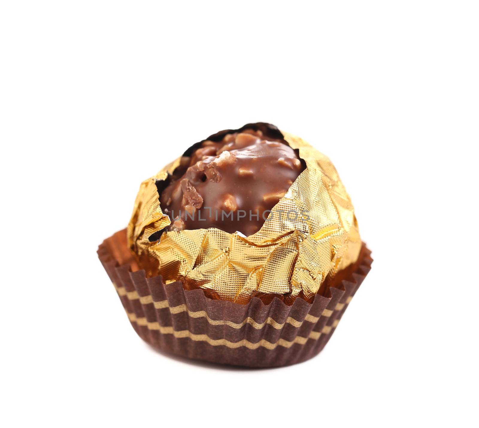 Chocolate gold foil bonbon. Isolated on a white background.
