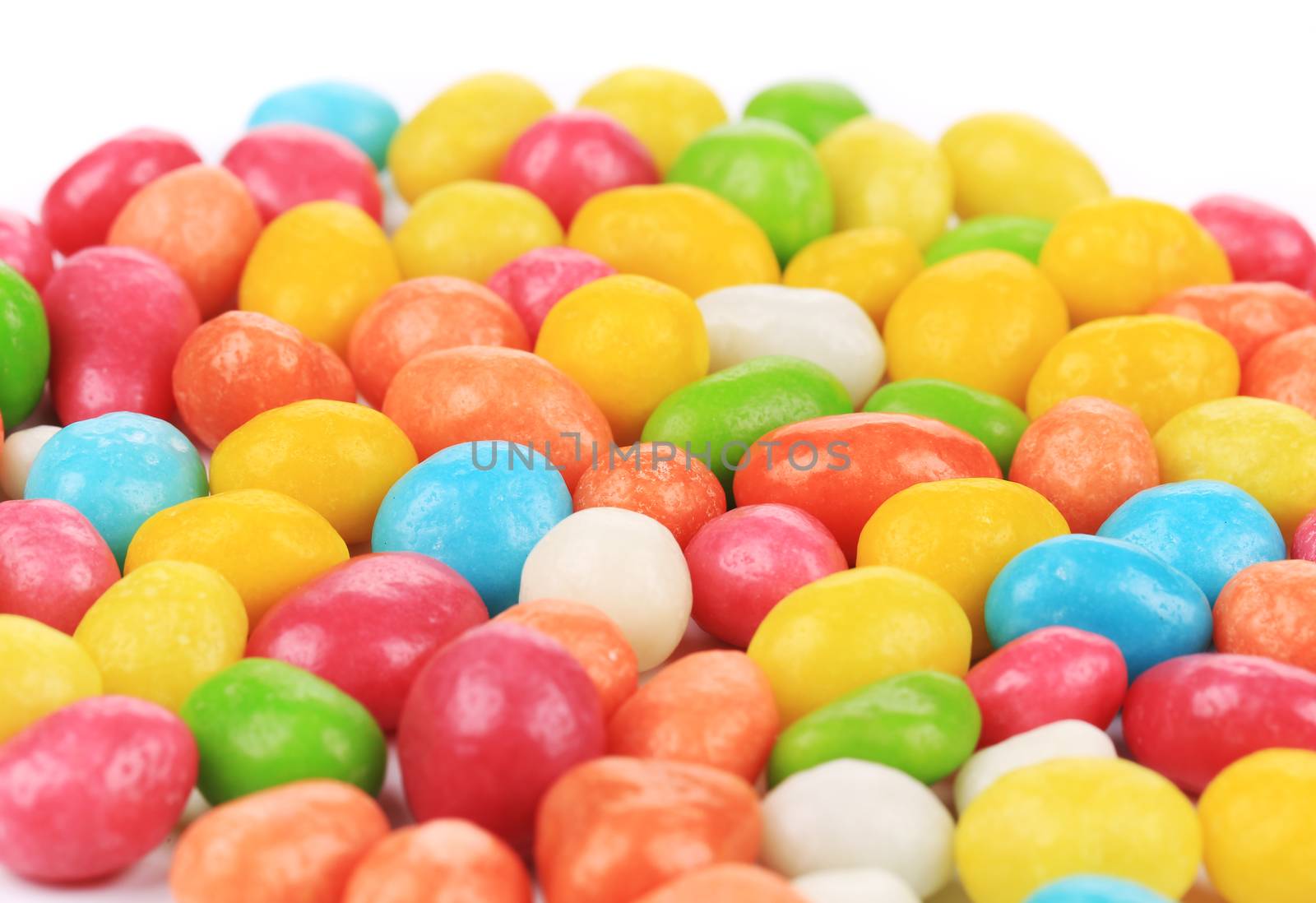 Tasty dragee closeup. Isolated on a white background.