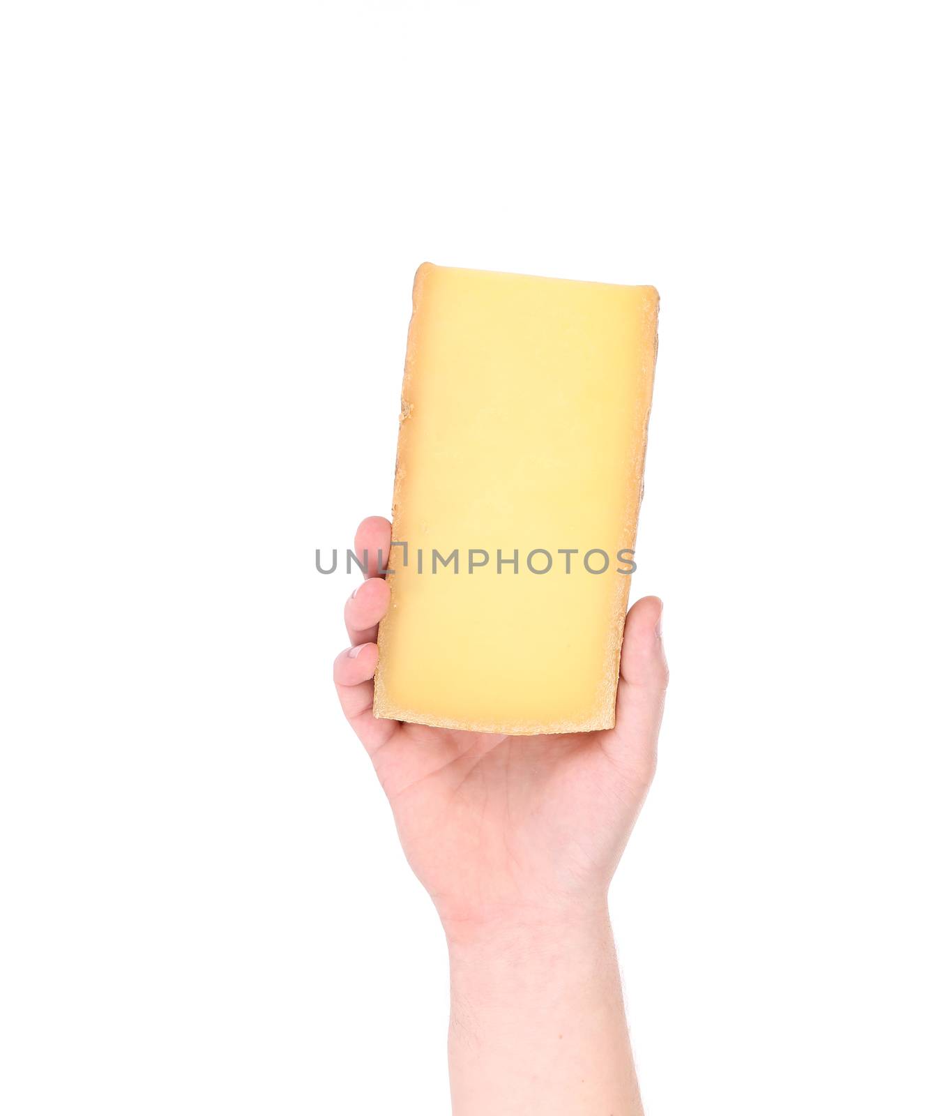Hand holding block of parmesan cheese. Isolated on a white background.