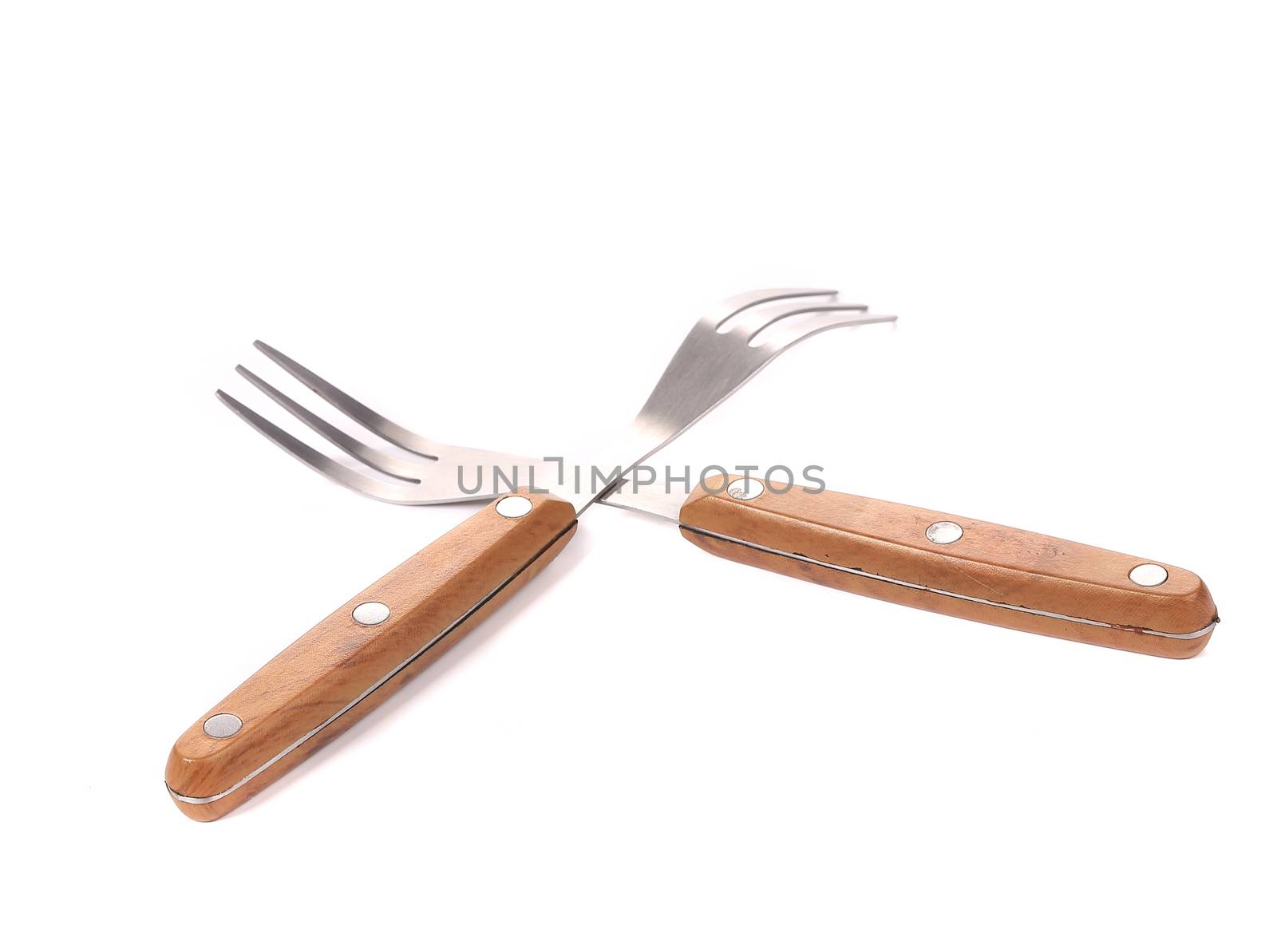 Two wooden handle forks. Isolated on a white background.