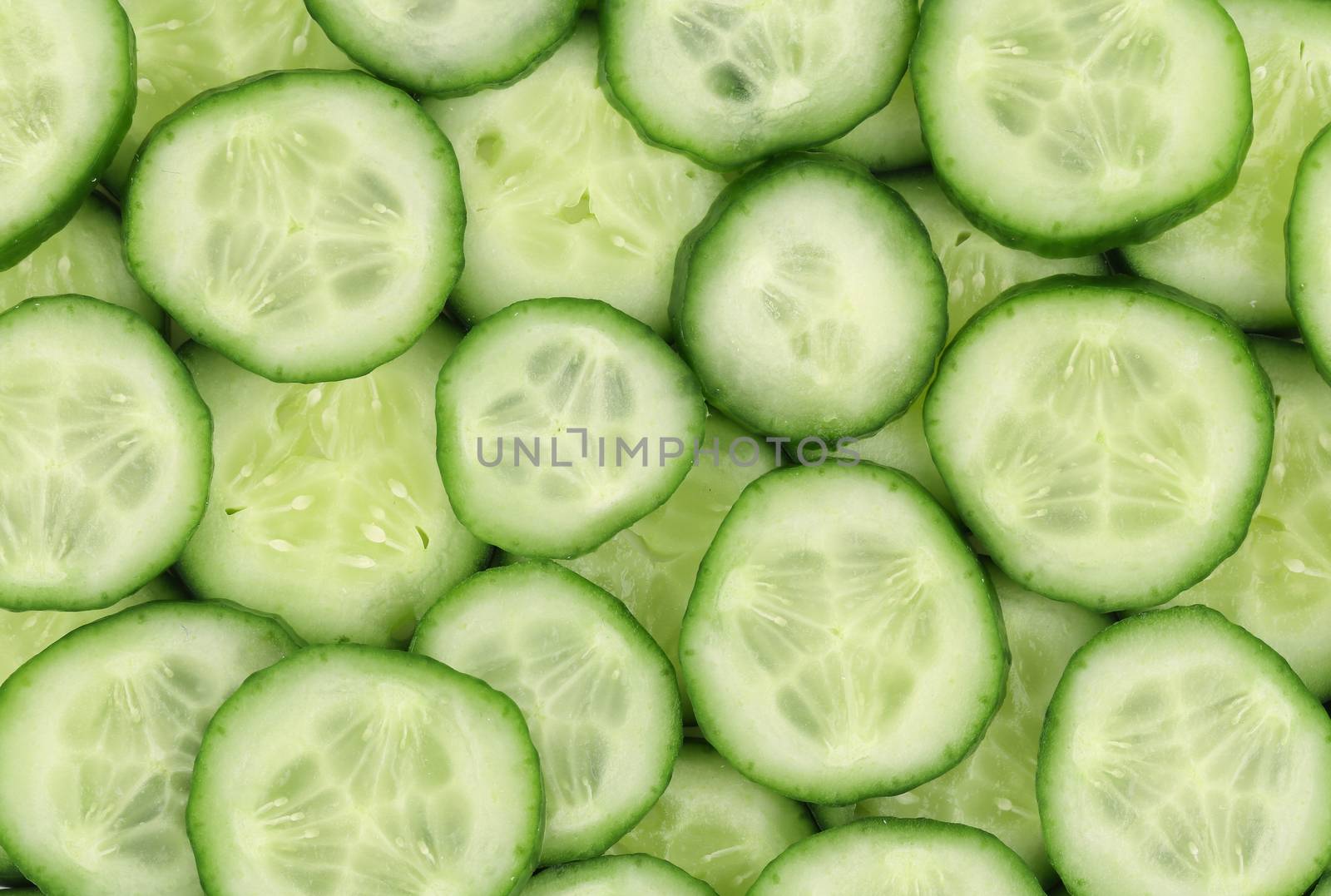 Fresh cucumber closeup. by indigolotos