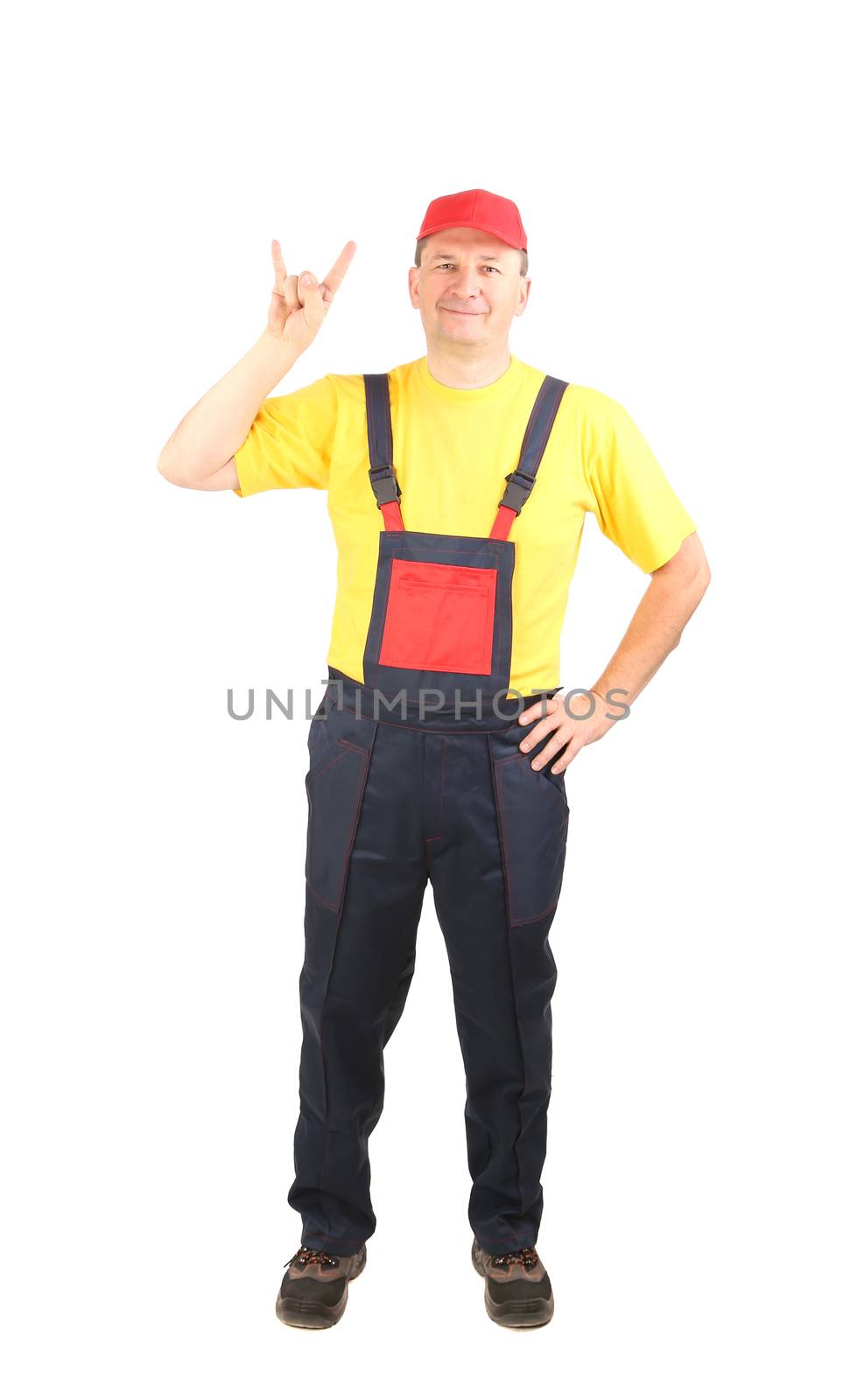 Man in working clothes showing rock sign. Isolated on a white background.