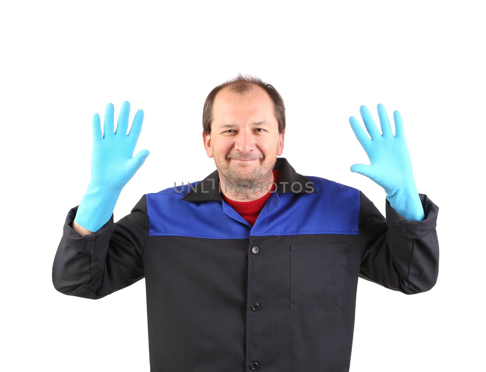 Man in workwear showing palms. Isolated on a white background.