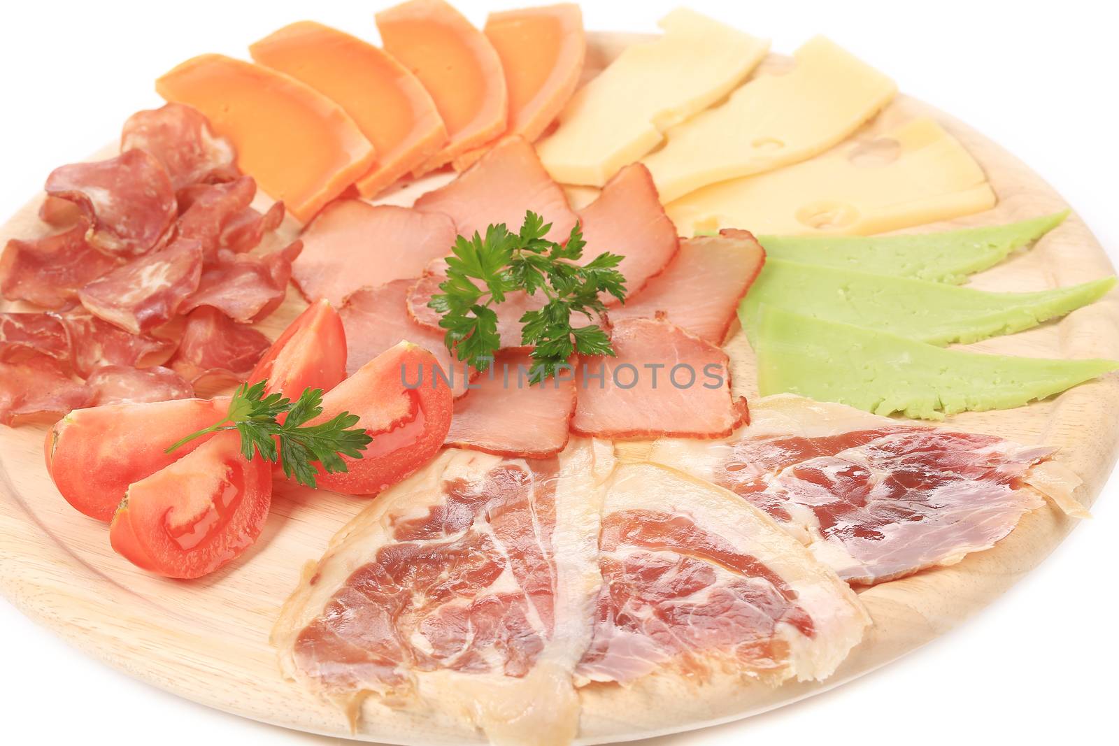 Meat and cheese plate. Isolated on a white background.