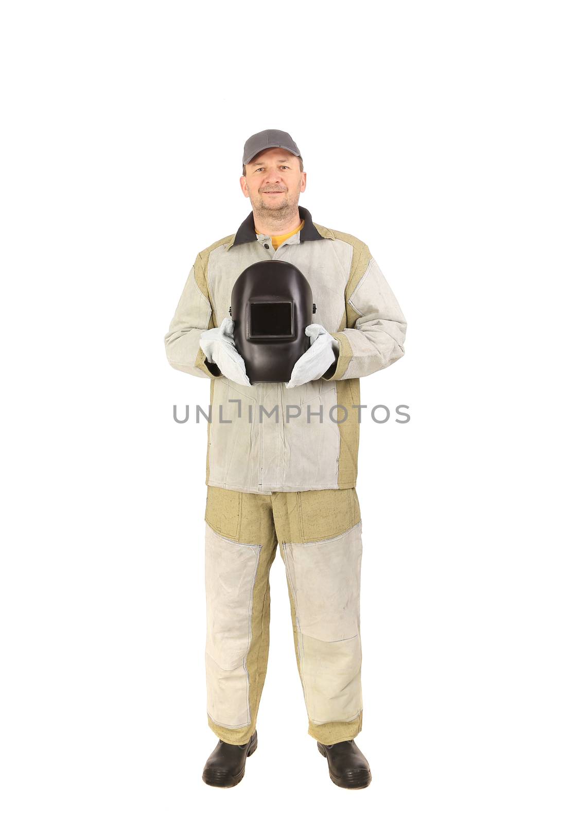 Confident welder holding mask. Isolated on a white background.