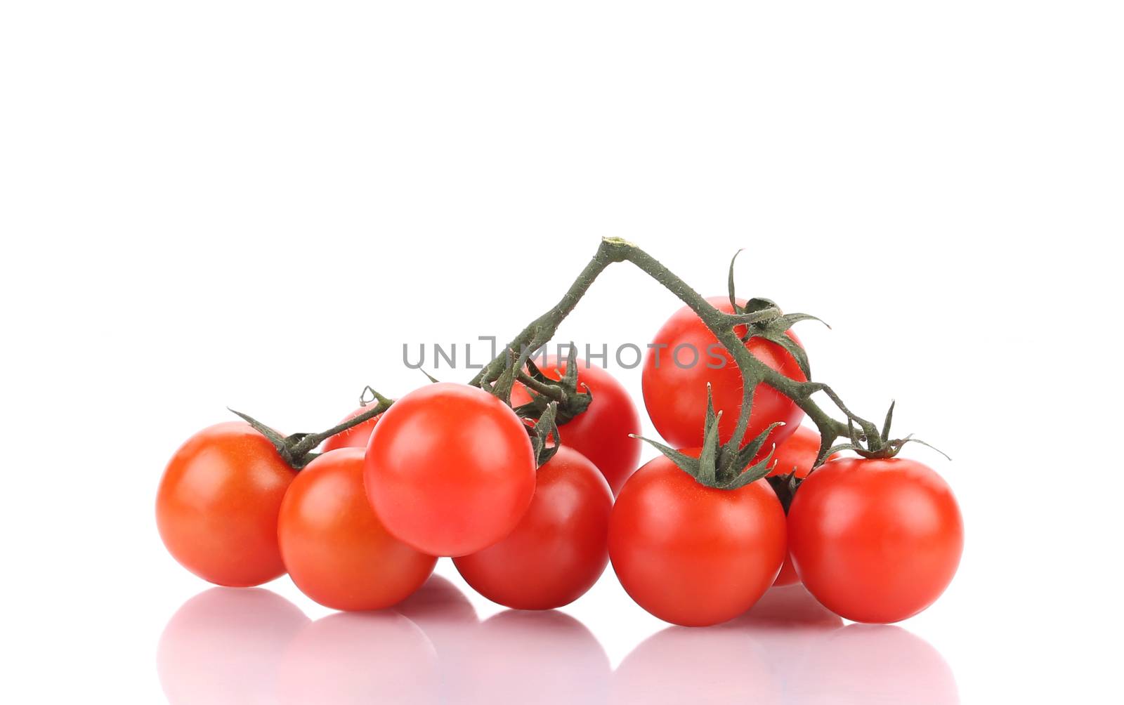 Tasty ripe tomatoes-cherry. Isolated on a white background.