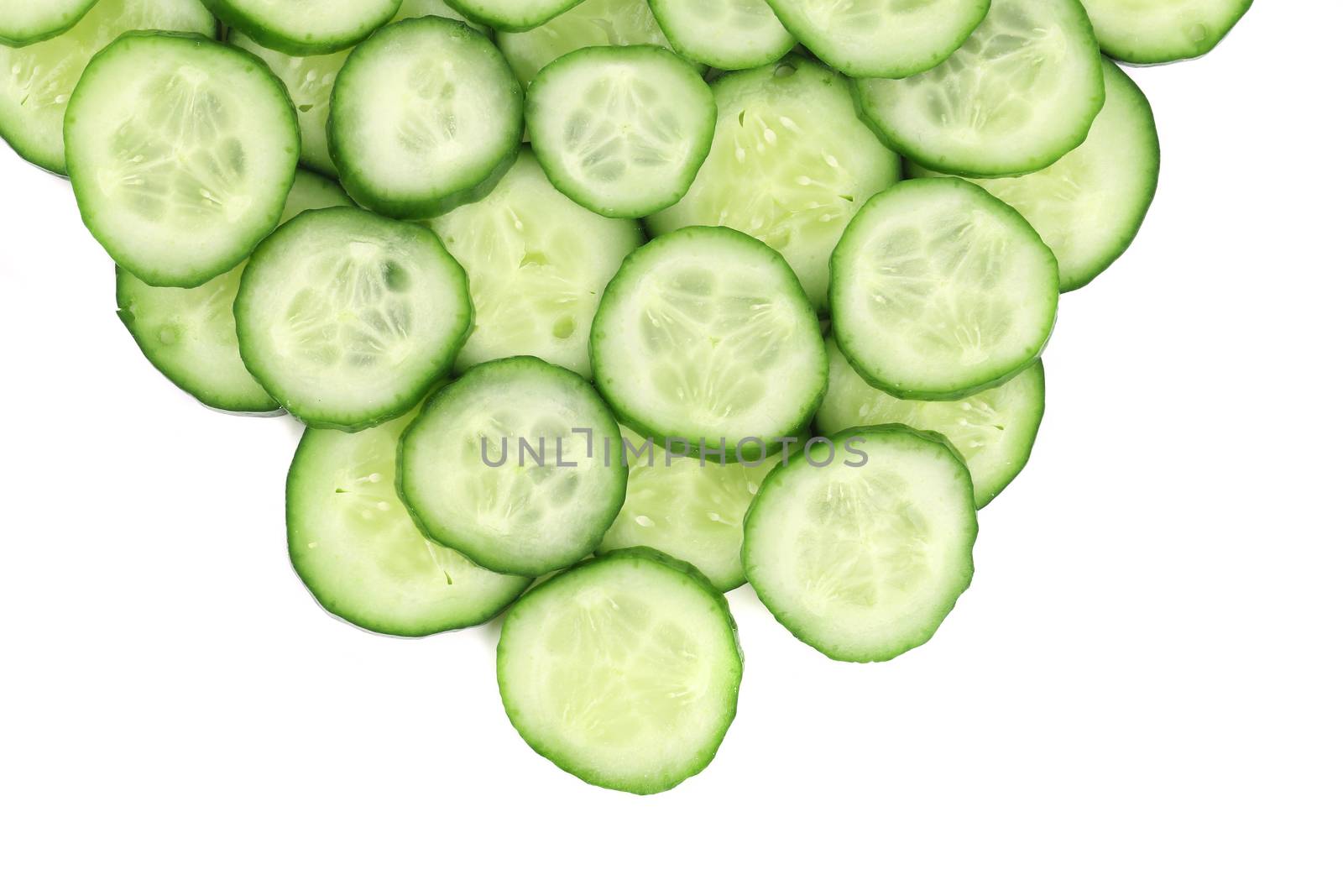 Fresh crispy cucumber closeup. Isolated on a white background.