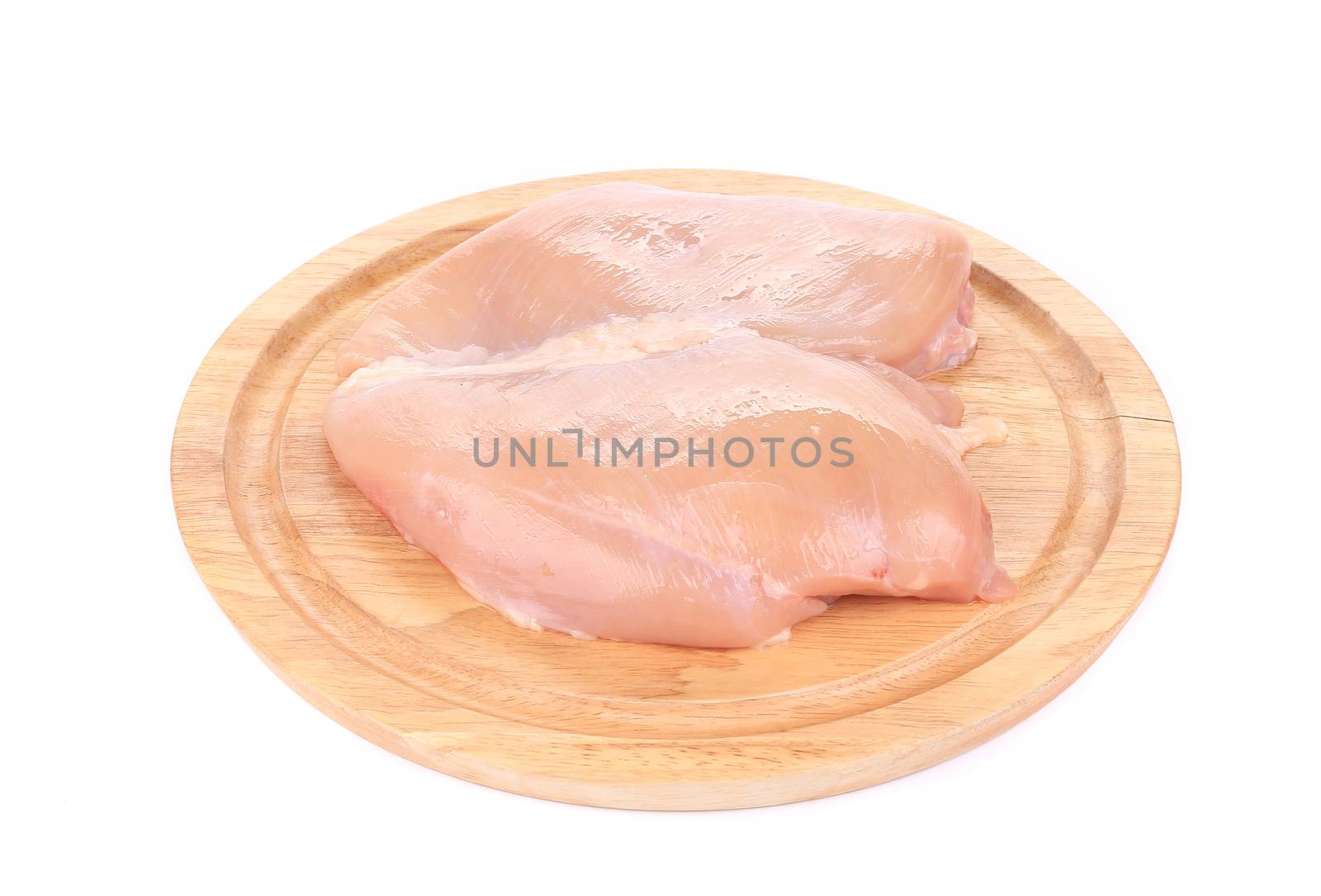 Two chicken fillets on platter. Isolated on a white background.