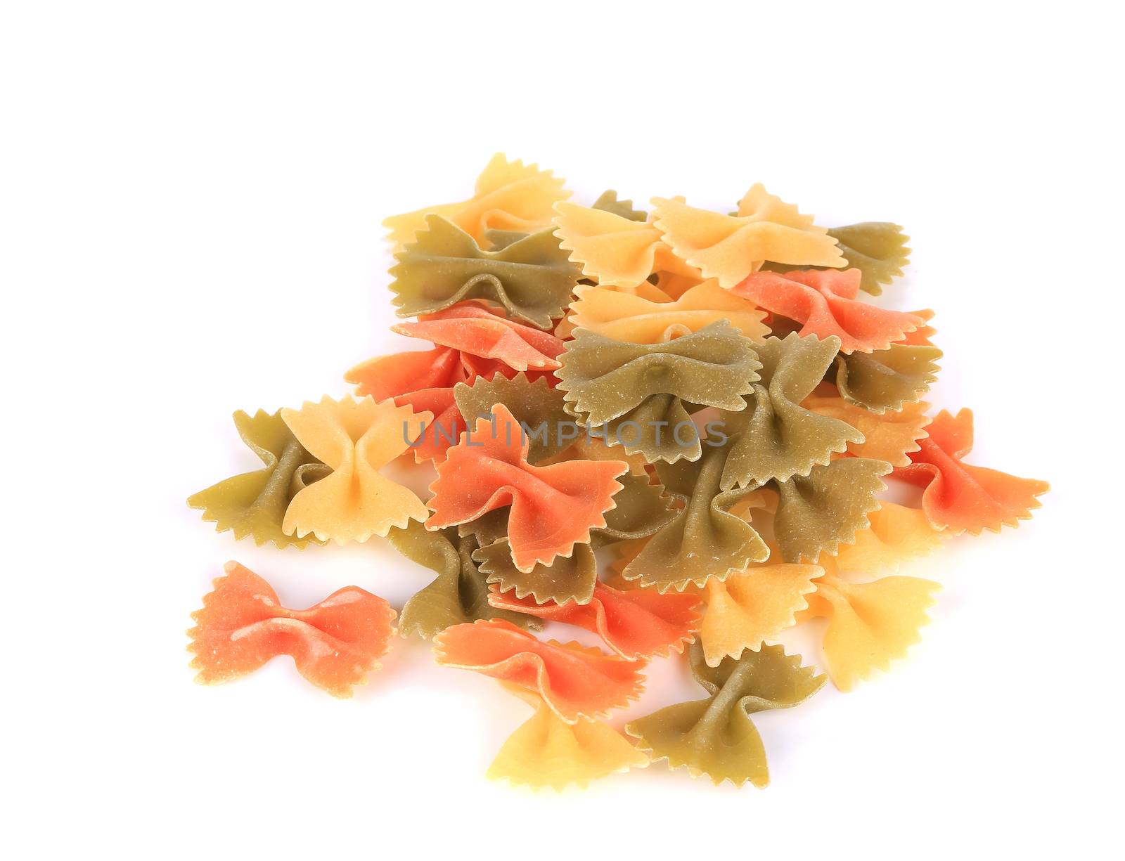 Raw italian pasta farfalle. Isolated on a white background.