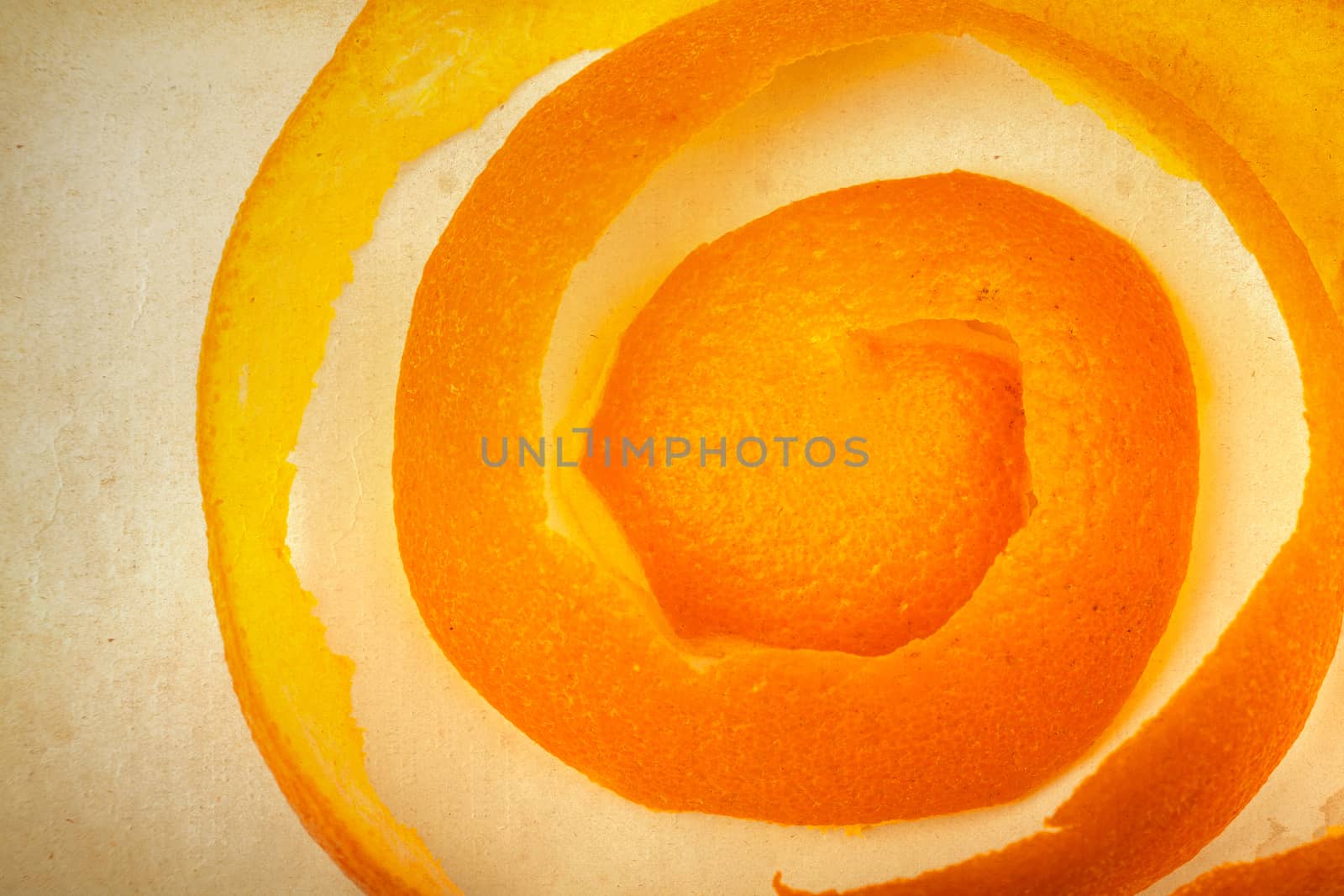 orange peel on the background of old paper