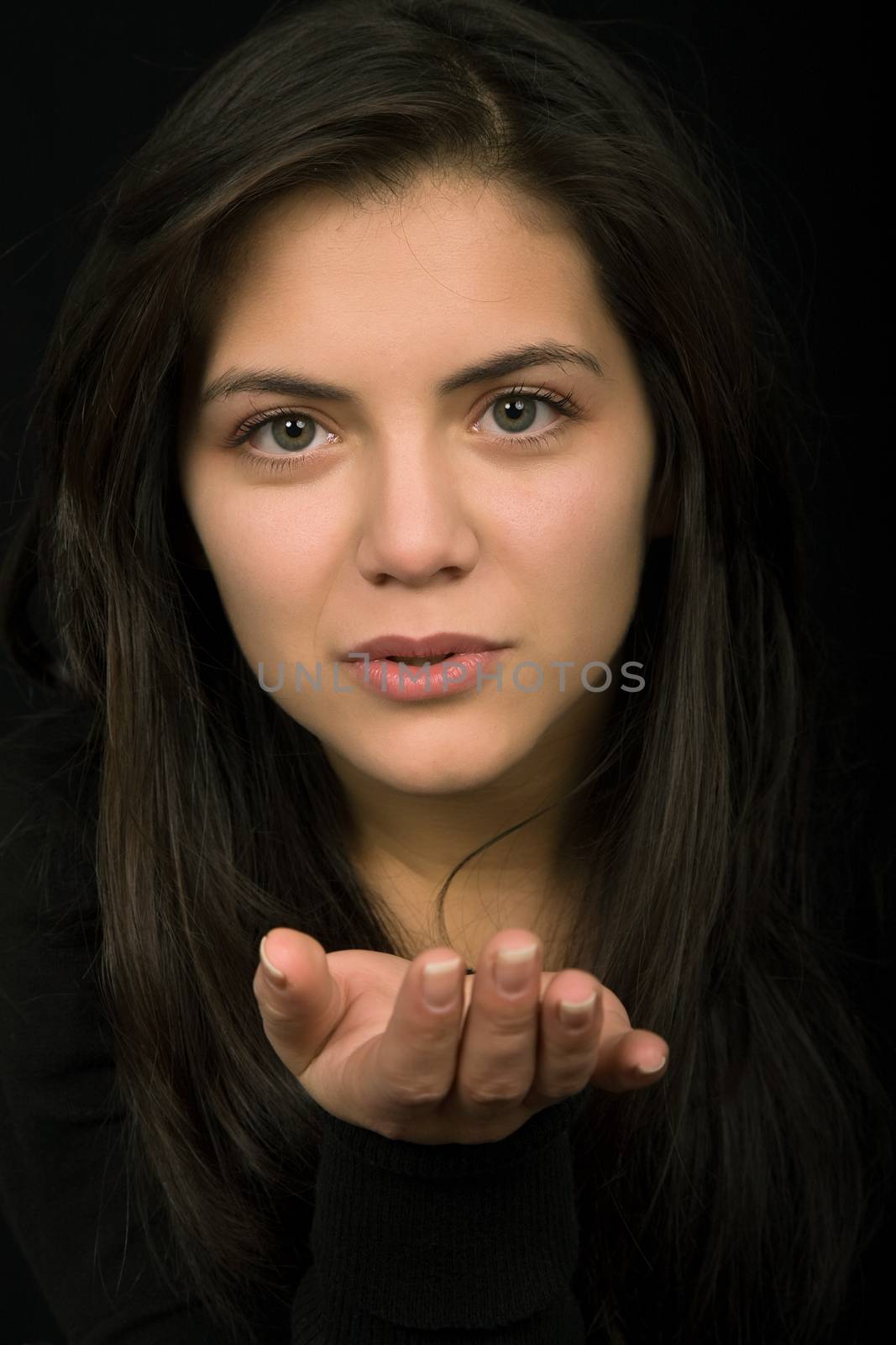 young woman portrait isolated on black background