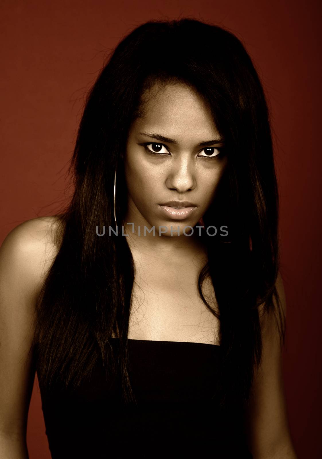 young casual woman close up portrait, studio shot