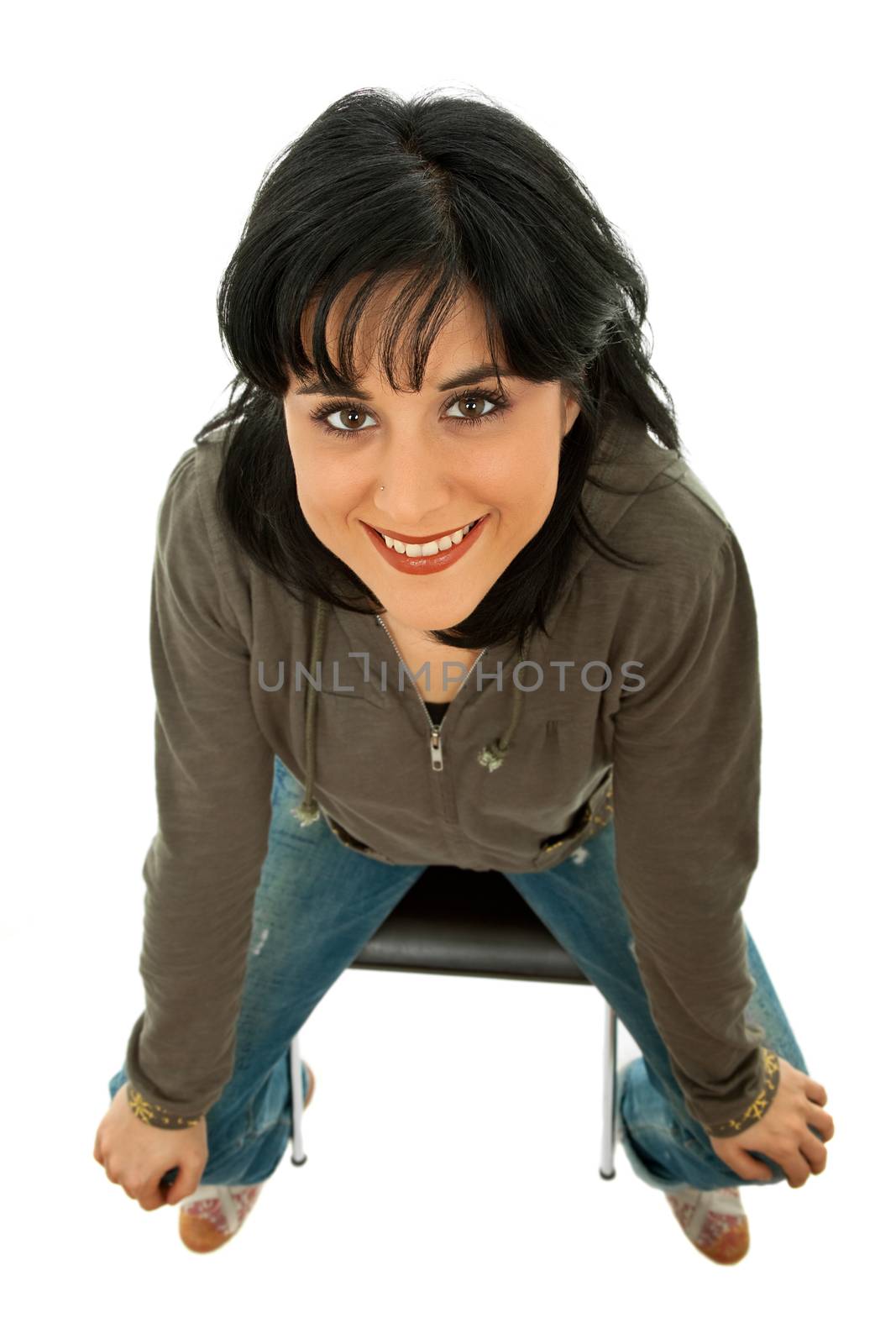 young casual woman on a chair, isolated on white