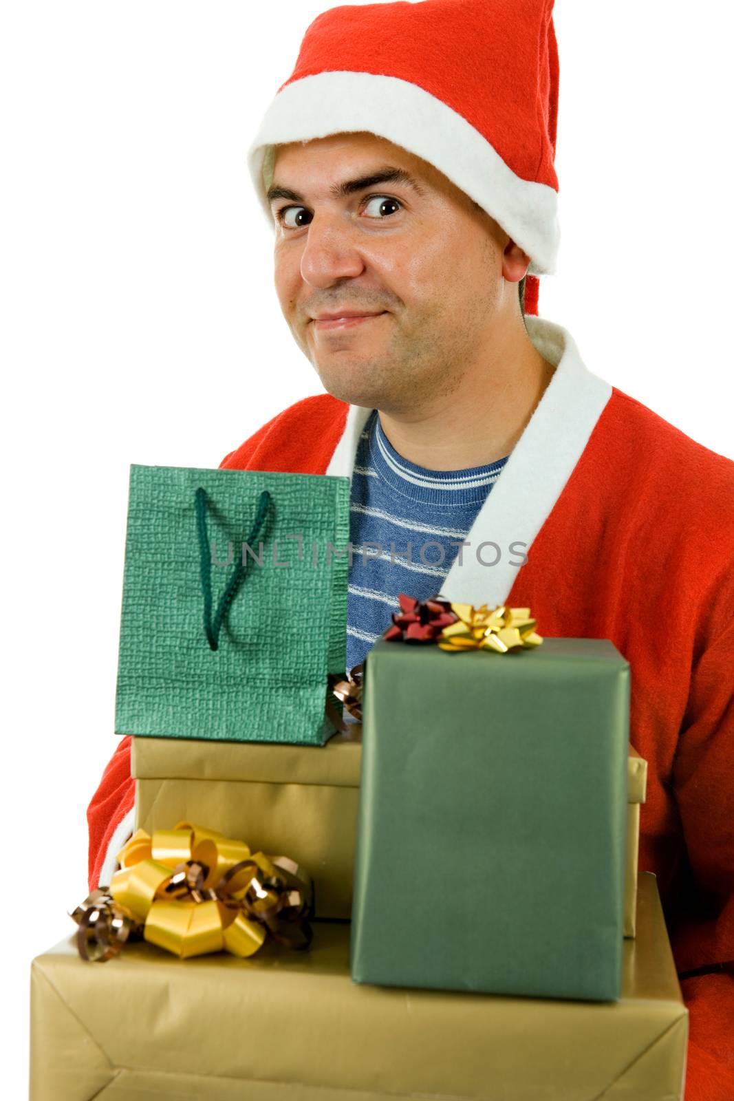 young man with santa hat holding some gifts, isolated