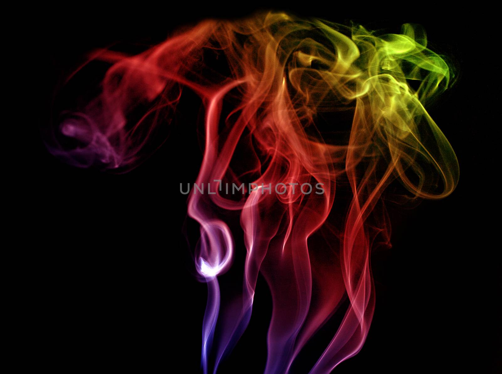 Colorful smoke on black background