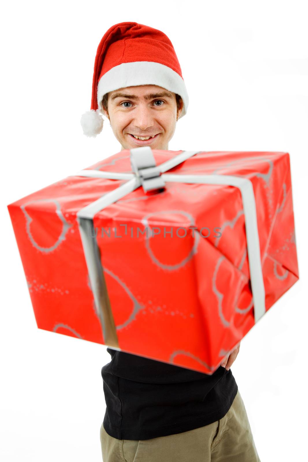 young man with santa hat holding a gift, isolated