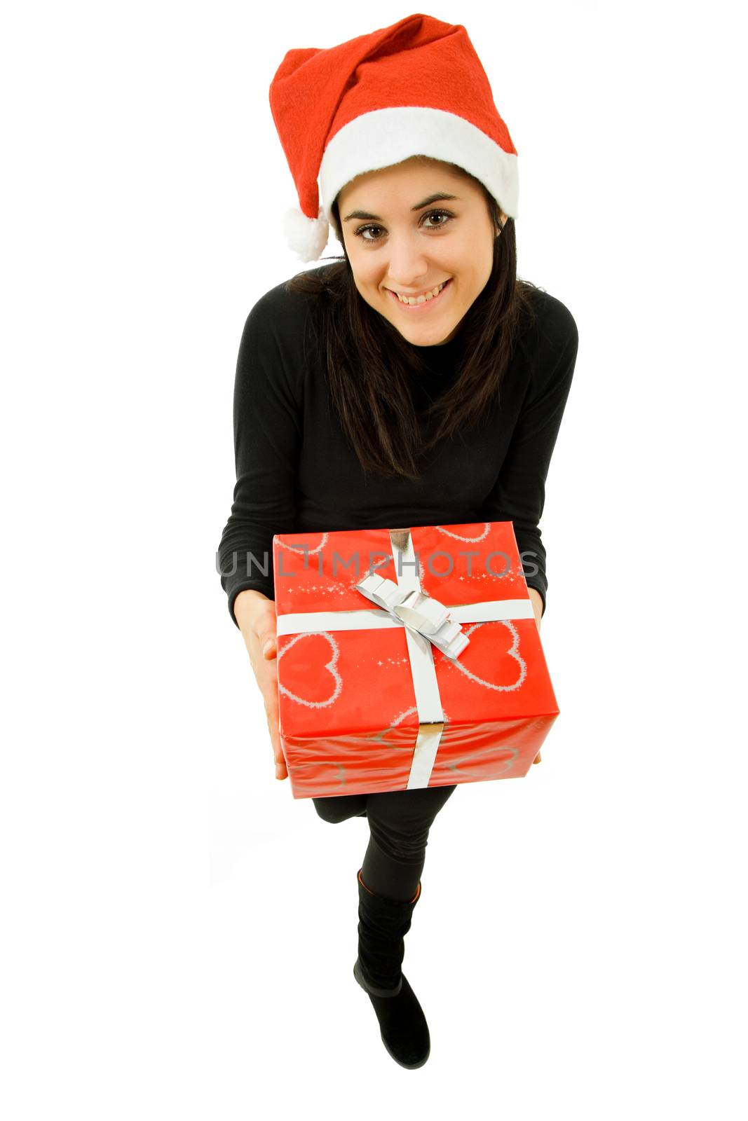 beautiful young girl holding a christmas gift, isolated