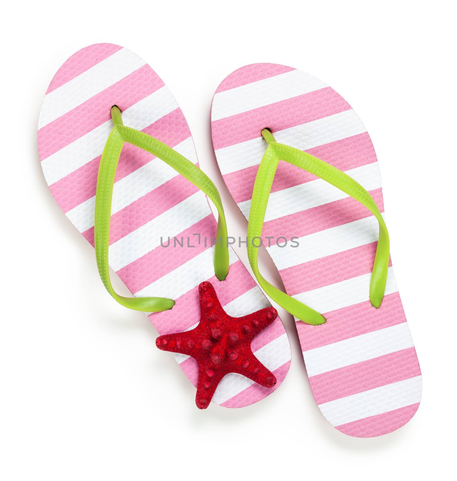 Summer flip flops with starfish on white background. Top view 