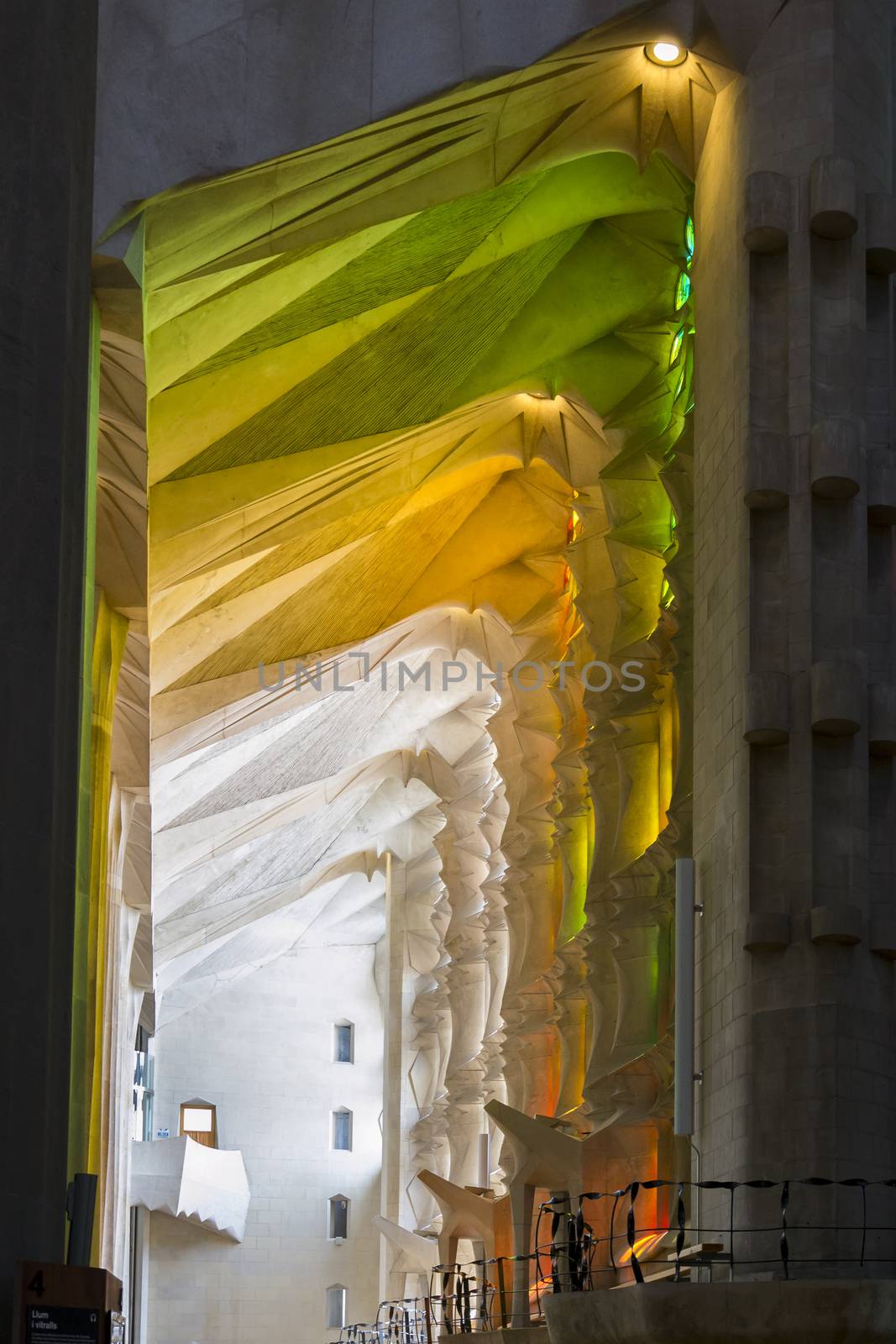 Particular of the colored light inside the Sagrada Familia in Barcelona