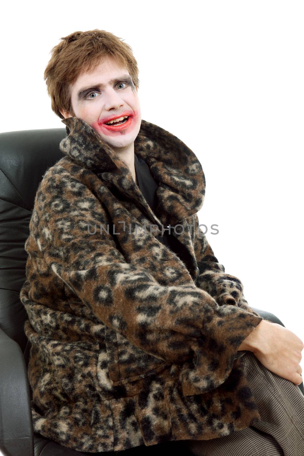 young man dressed as joker, isolated on white