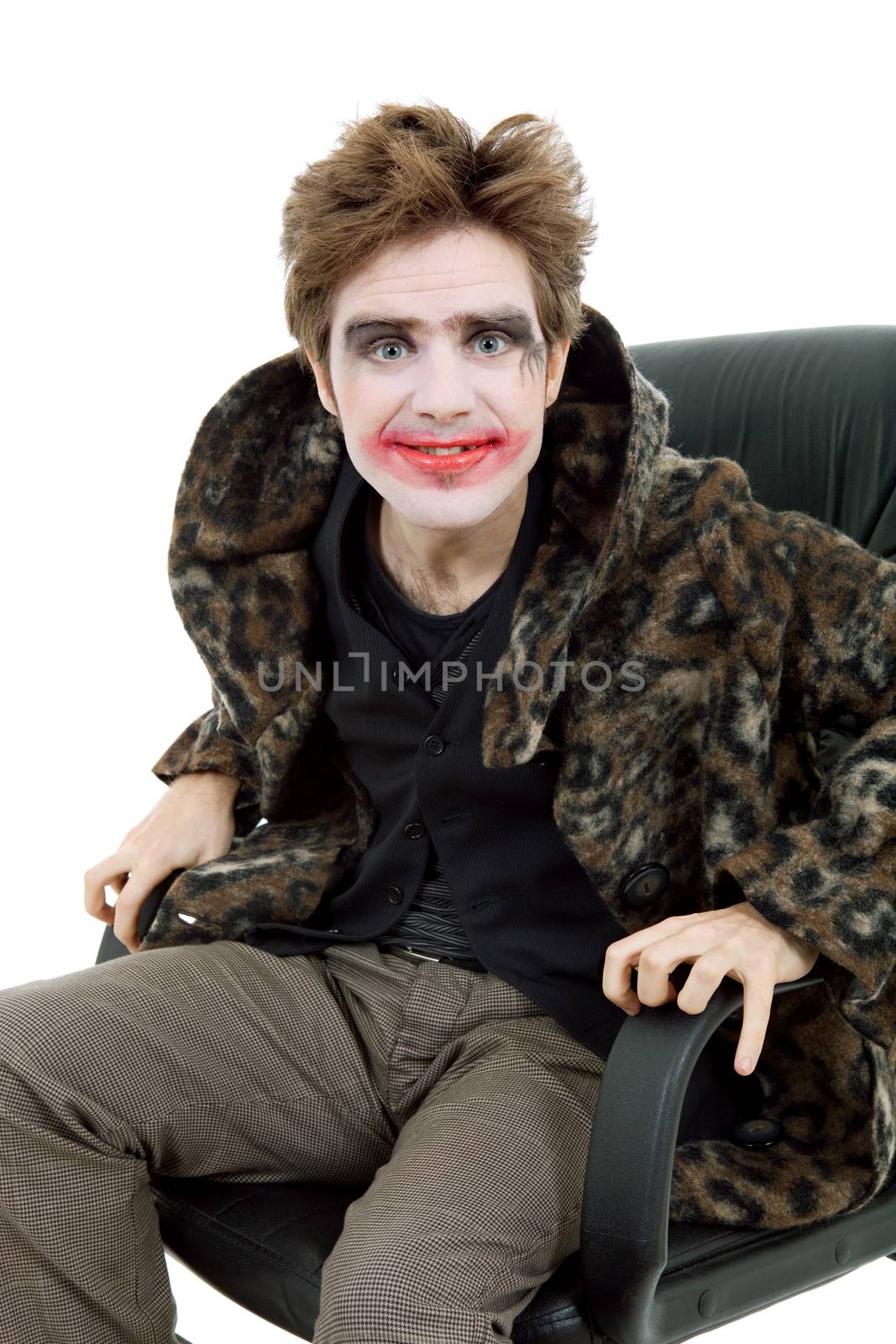 young man dressed as joker, isolated on white