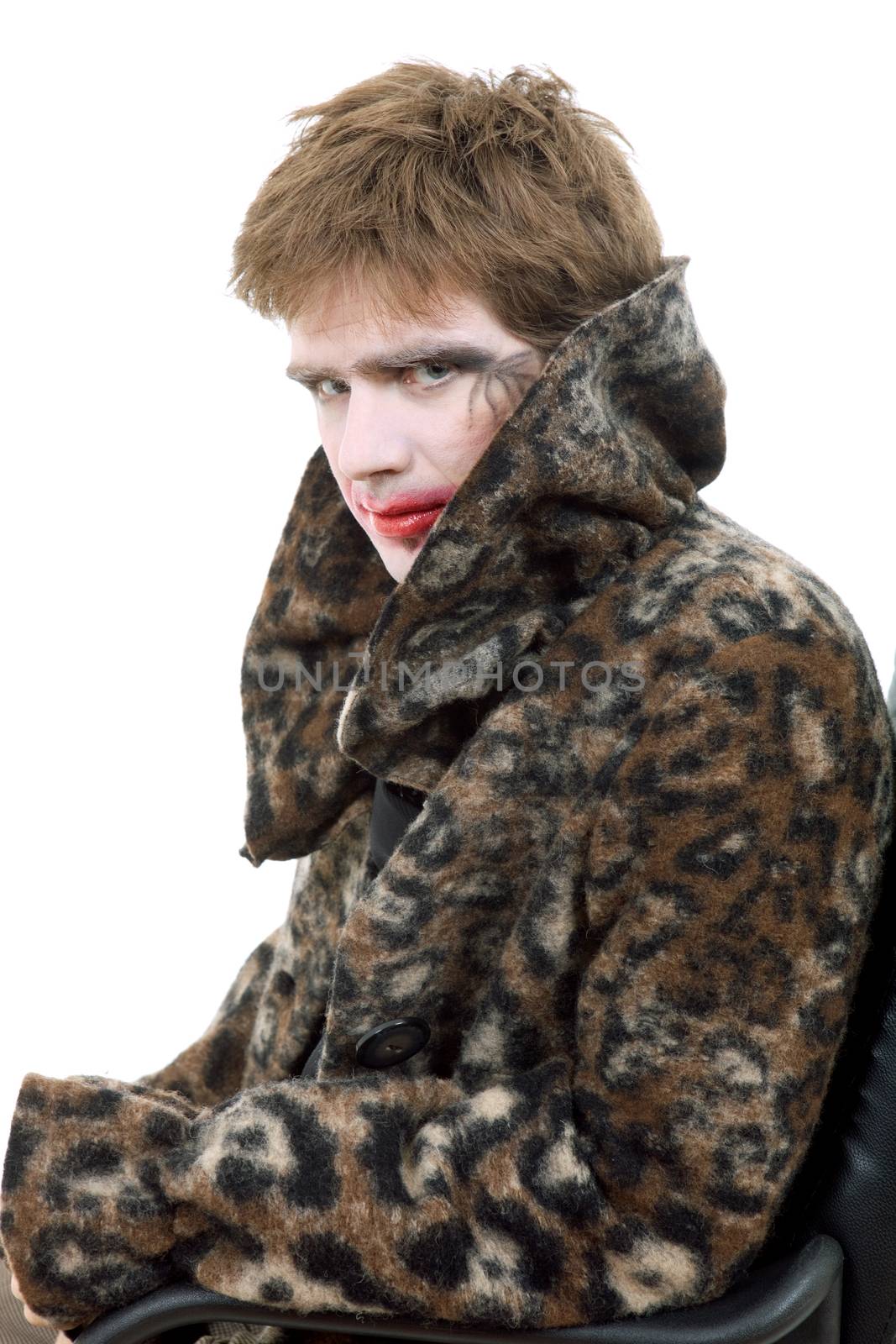 young man dressed as joker, isolated on white