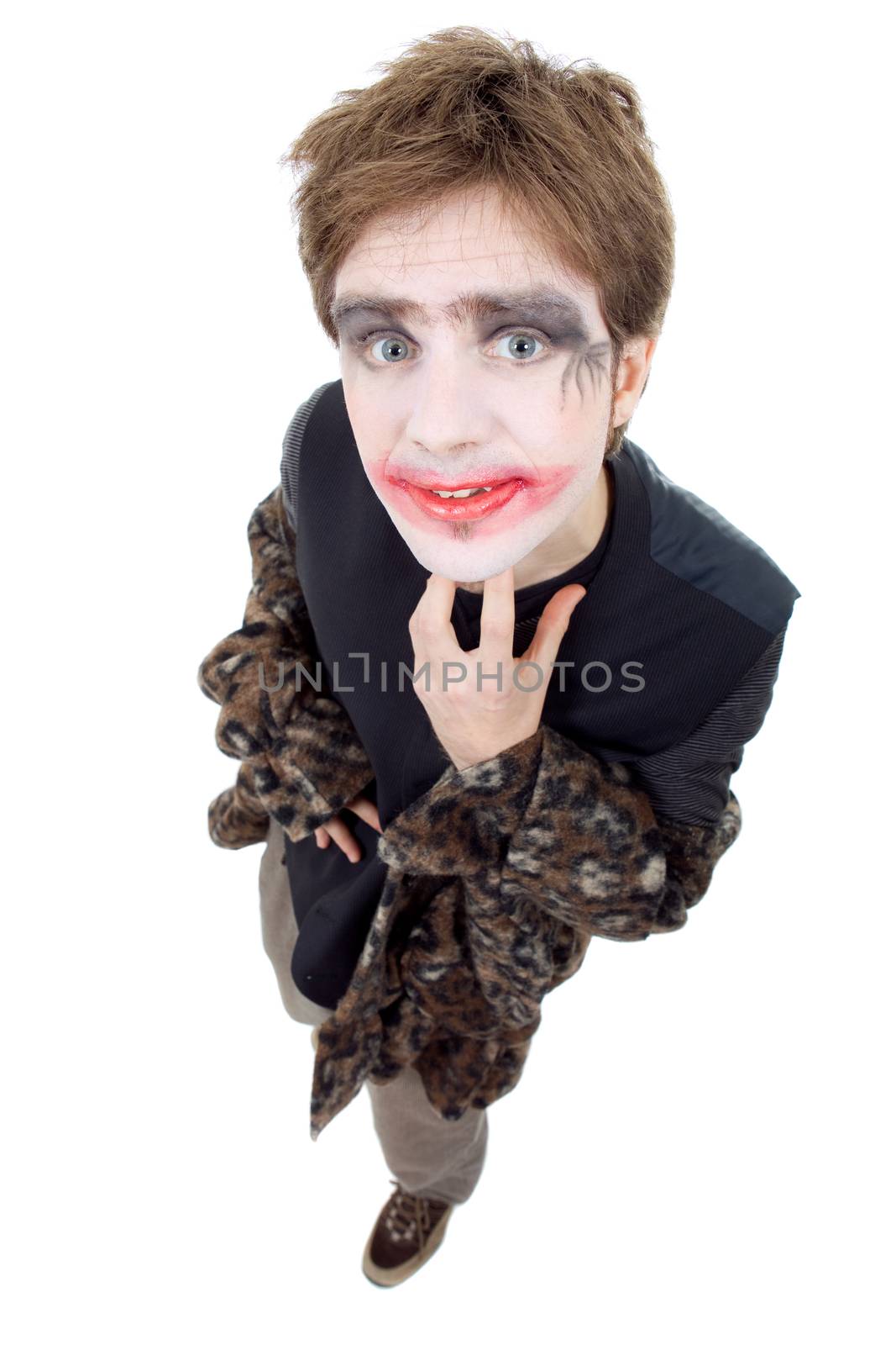 young man dressed as joker, isolated on white