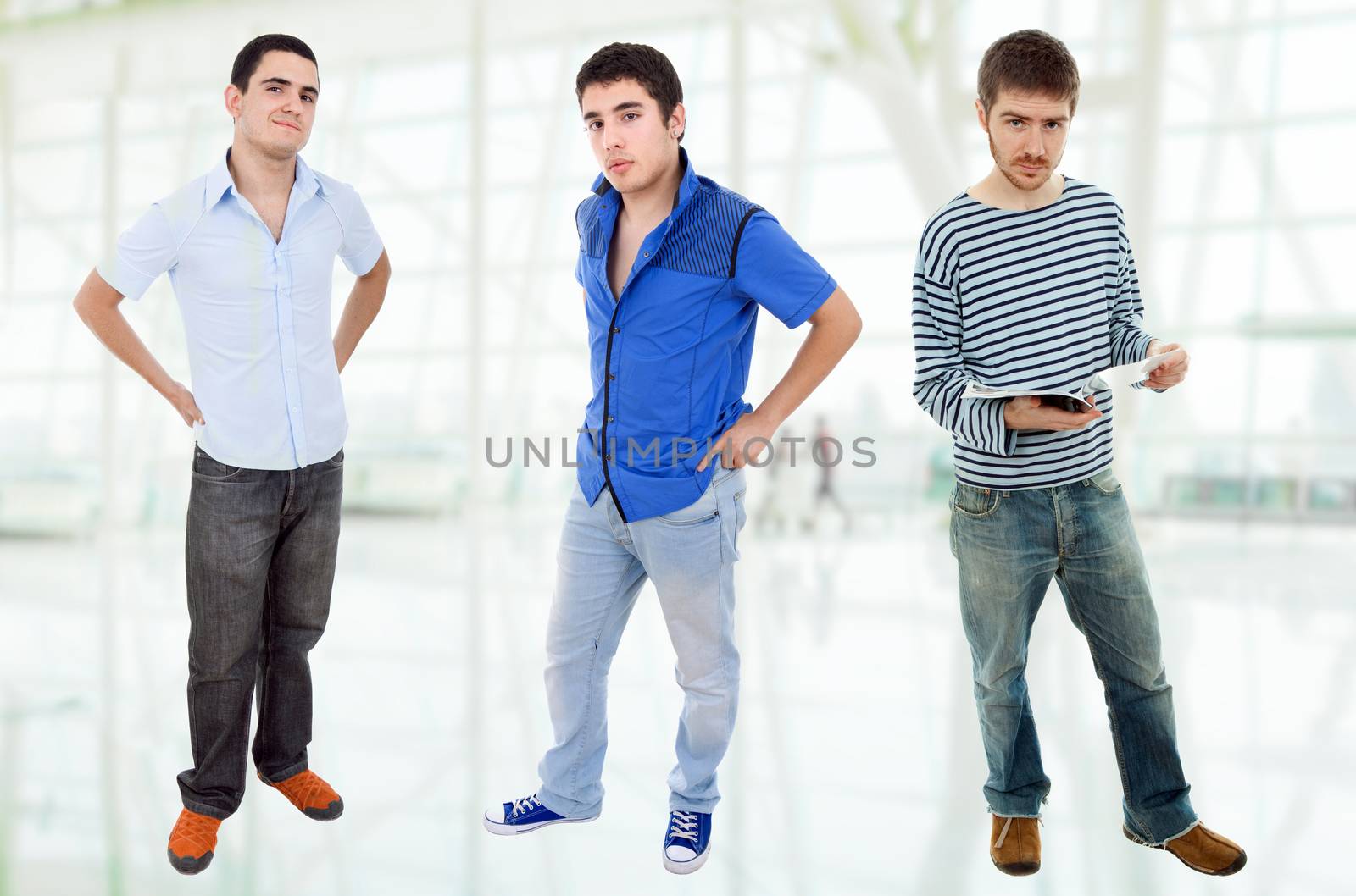 three young casual men standing