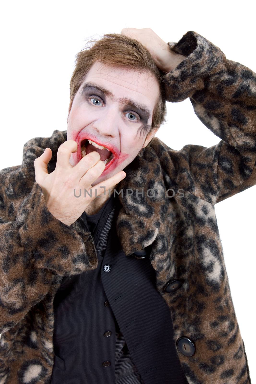 young man dressed as joker, isolated on white