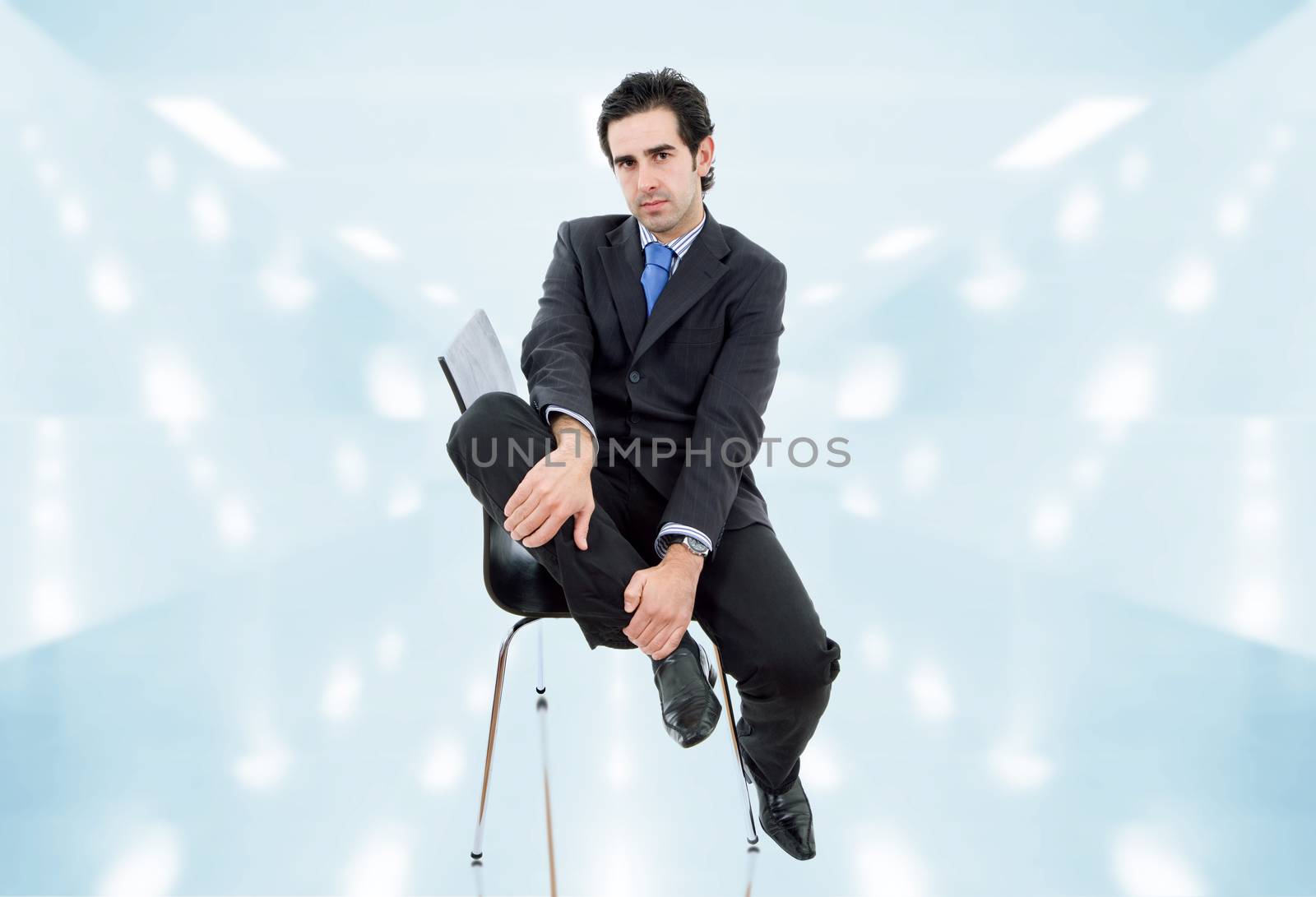 young businessman on a chair at the office