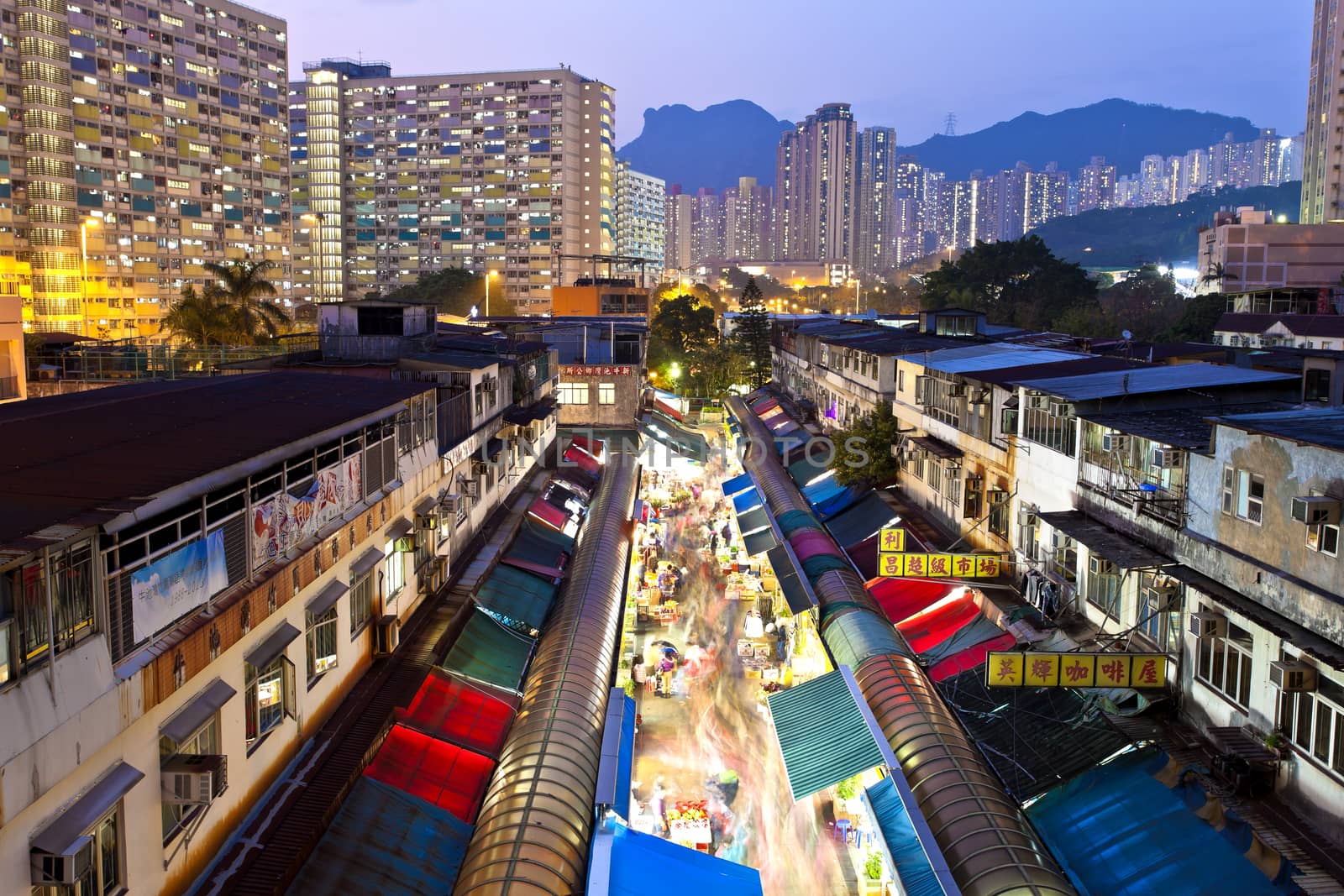 Local market in Hong Kong at night by kawing921