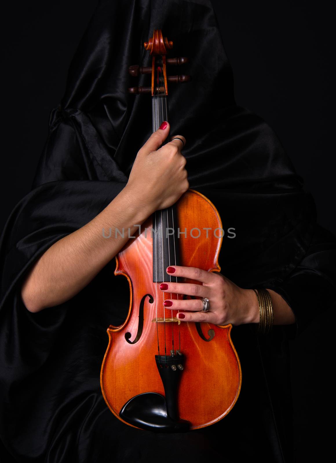 Female Violinist Holds Bow Across Saturated Musical Violin Acous by ChrisBoswell