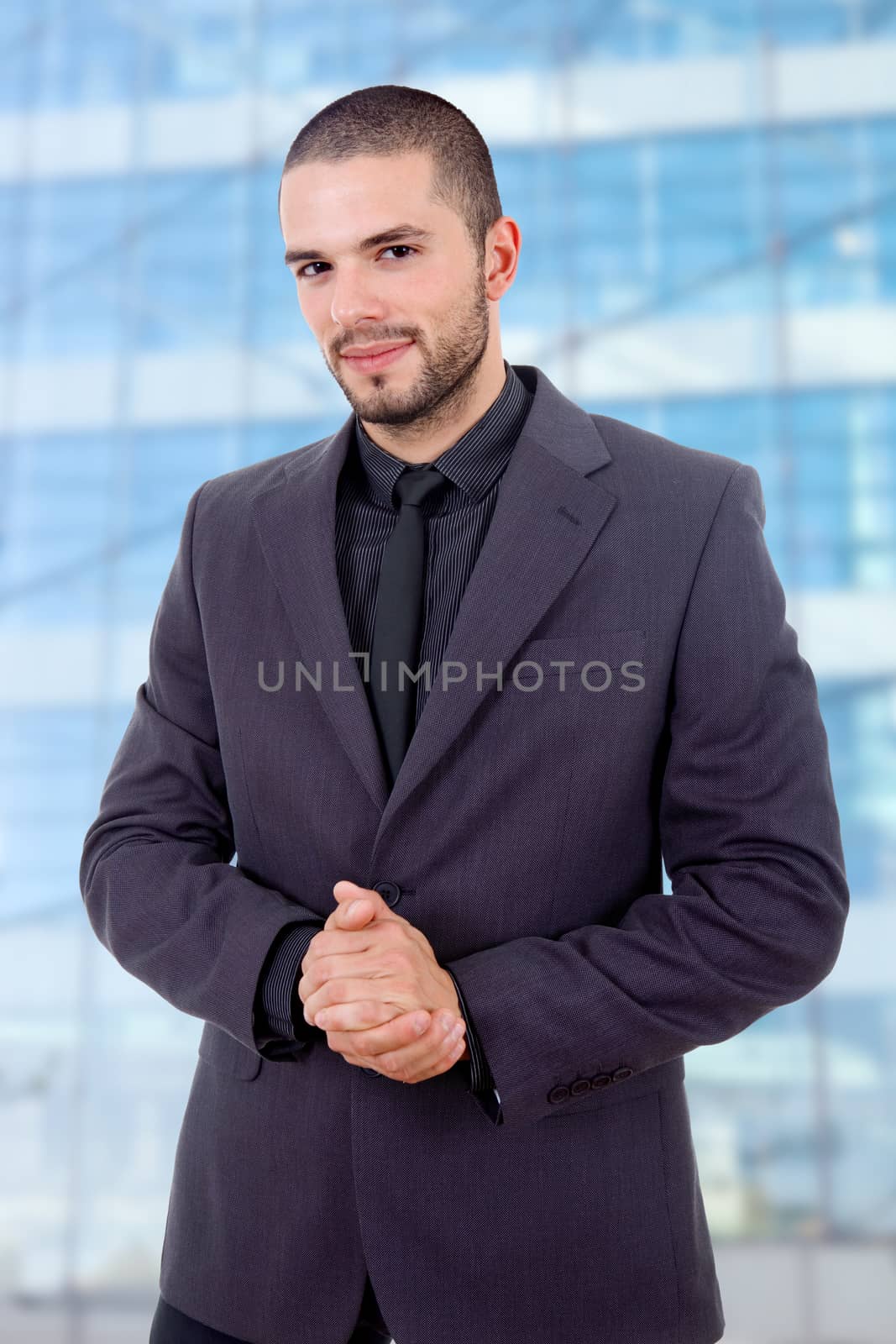 young business man portrait at the office