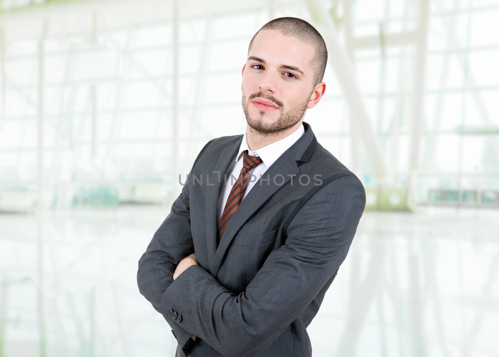 young business man portrait at the office