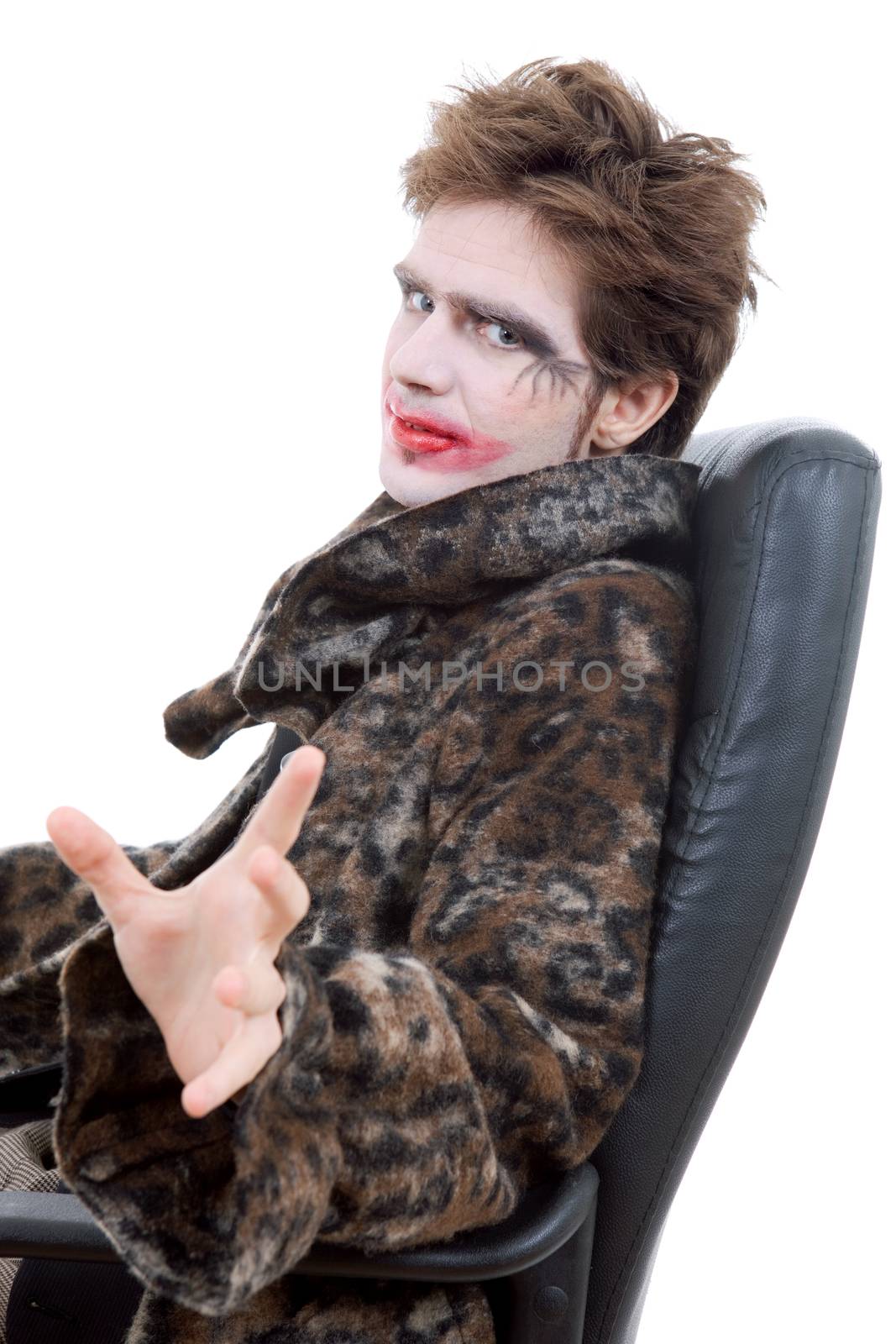 young man dressed as joker, isolated on white