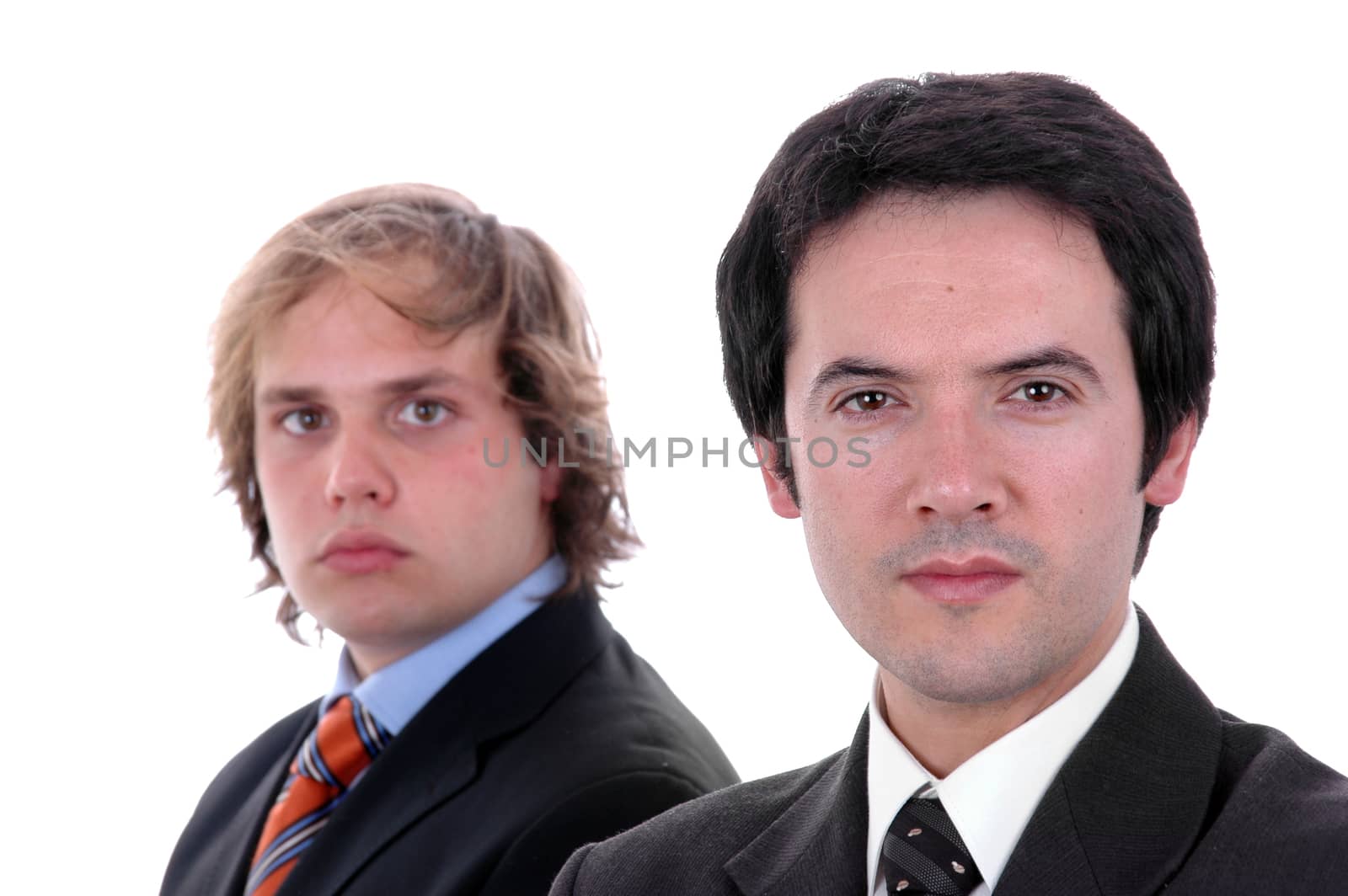 two young business men portrait on white. focus on the right man