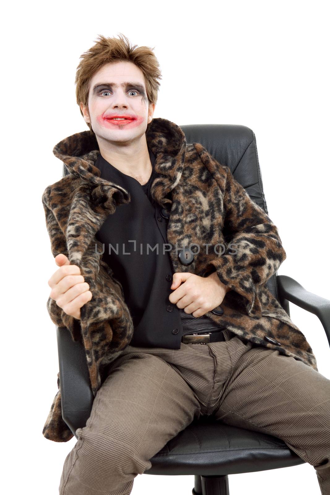 young man dressed as joker, isolated on white