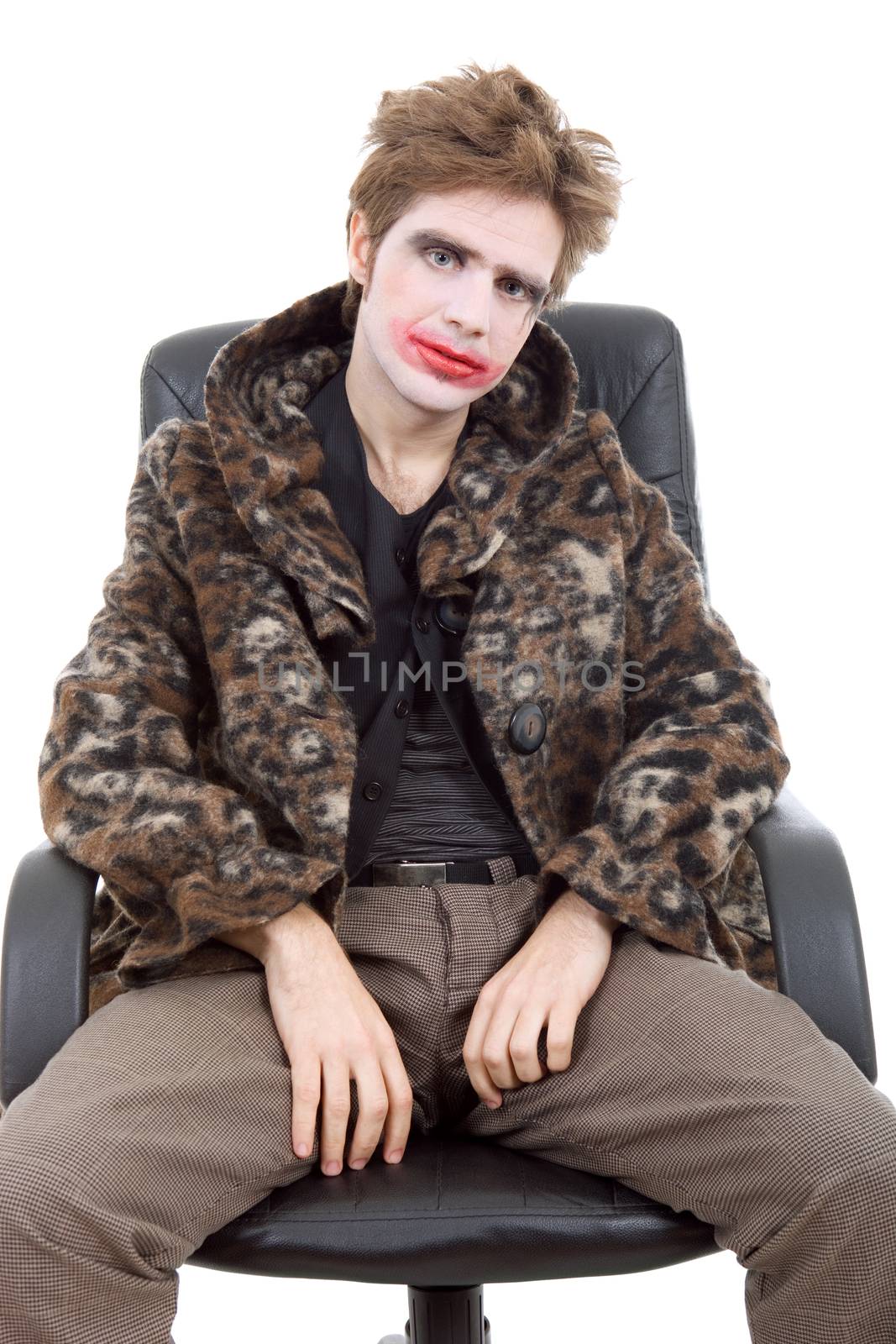 young man dressed as joker, isolated on white